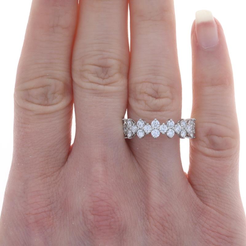 Retail Price: $18,000

Size: 8

Brand: Tiffany & Co.
Collection: Aria

Metal Content: 950 Platinum

Stone Information
Natural Diamonds
Carat(s): 3.15ctw
Cut: Round Brilliant
Color: E - F
Clarity: VVS1 - VS1

Total Carats: 3.15ctw

Style: Eternity