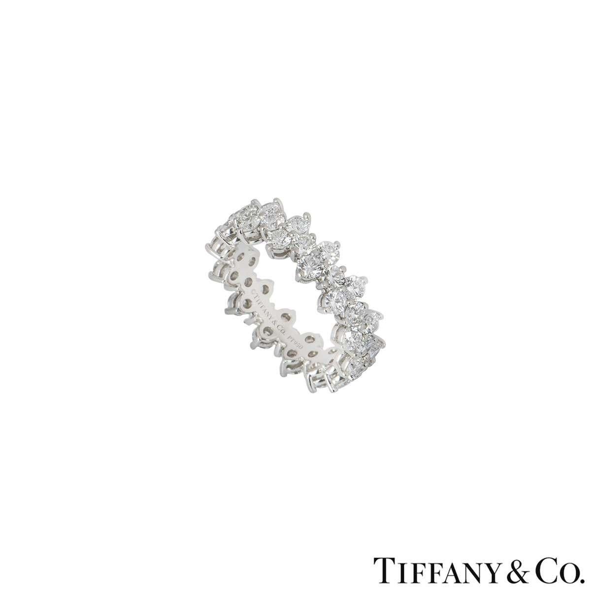 A stunning diamond eternity ring in platinum from the Aria collection by Tiffany & Co. The ring is composed of 42 round brilliant cut diamonds, alternating from a single round brilliant cut diamond to double set round brilliant cut diamonds. The