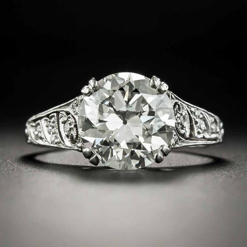 Expertly hand fabricated and hand engraved in lustrous platinum, circa 1920s-30s, by the preeminent American jeweler of the period - Tiffany & Company, this magnificent Art Deco ring radiates with a resplendent, bright white, 3.27-carat European-cut