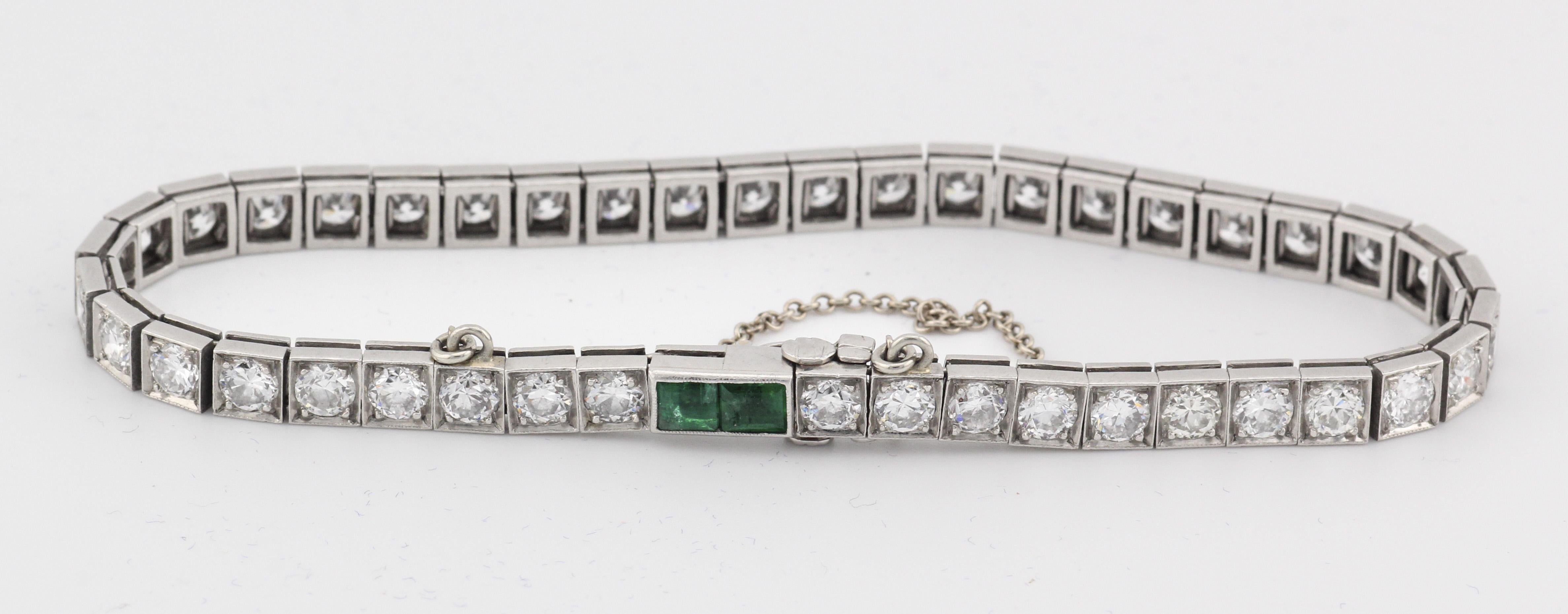 Brilliant Cut Tiffany & Co. Art Deco 5 CTW Diamond Emerald Platinum Line Tennis Bracelet For Sale