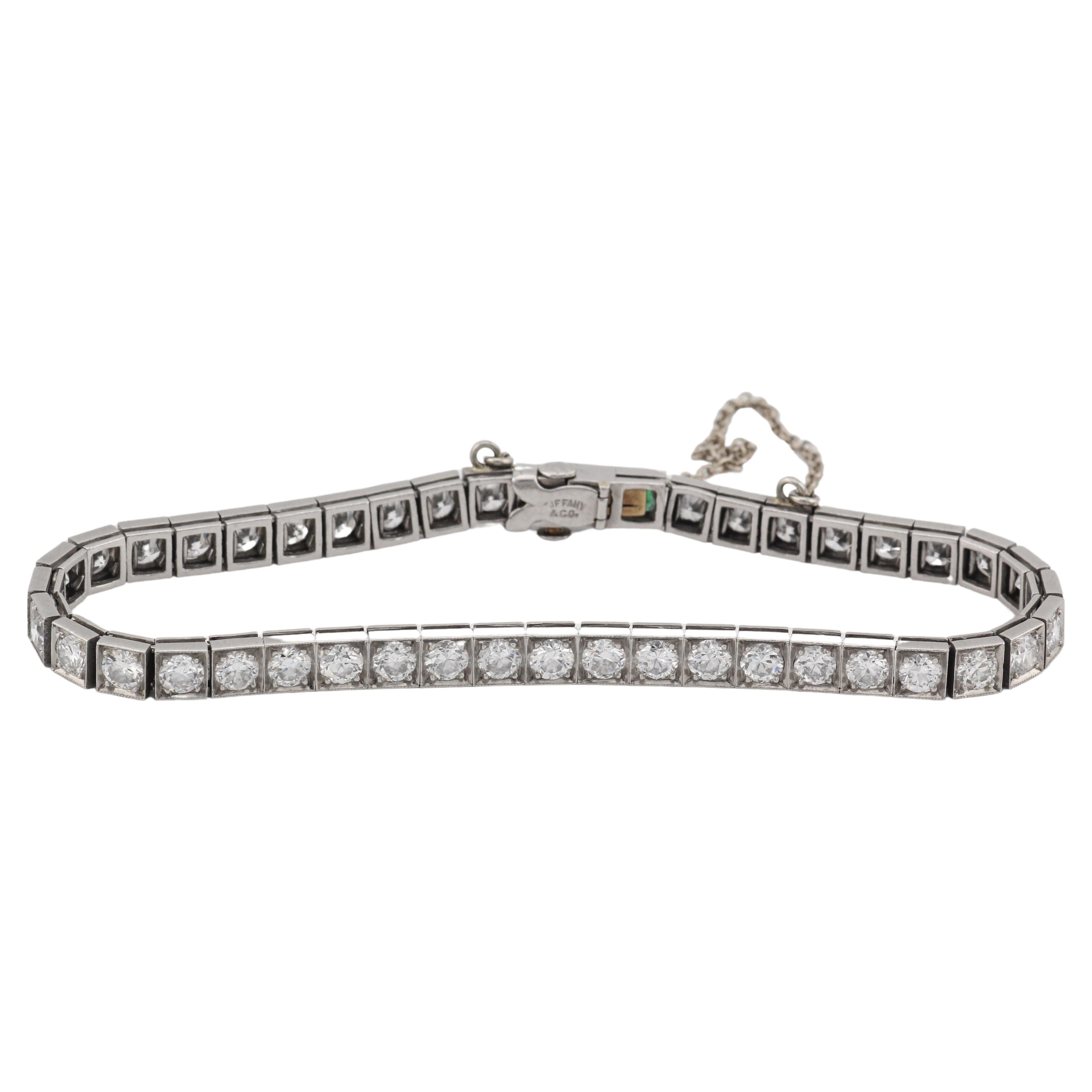 Tiffany & Co. Bracelet tennis Art déco avec diamants 5 carats et émeraudes en platine