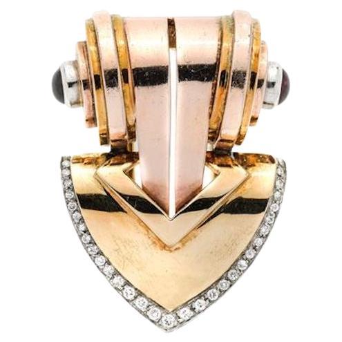 Tiffany & Co. Late Art Deco Clip Brooch in Gold, Diamonds and Rubies