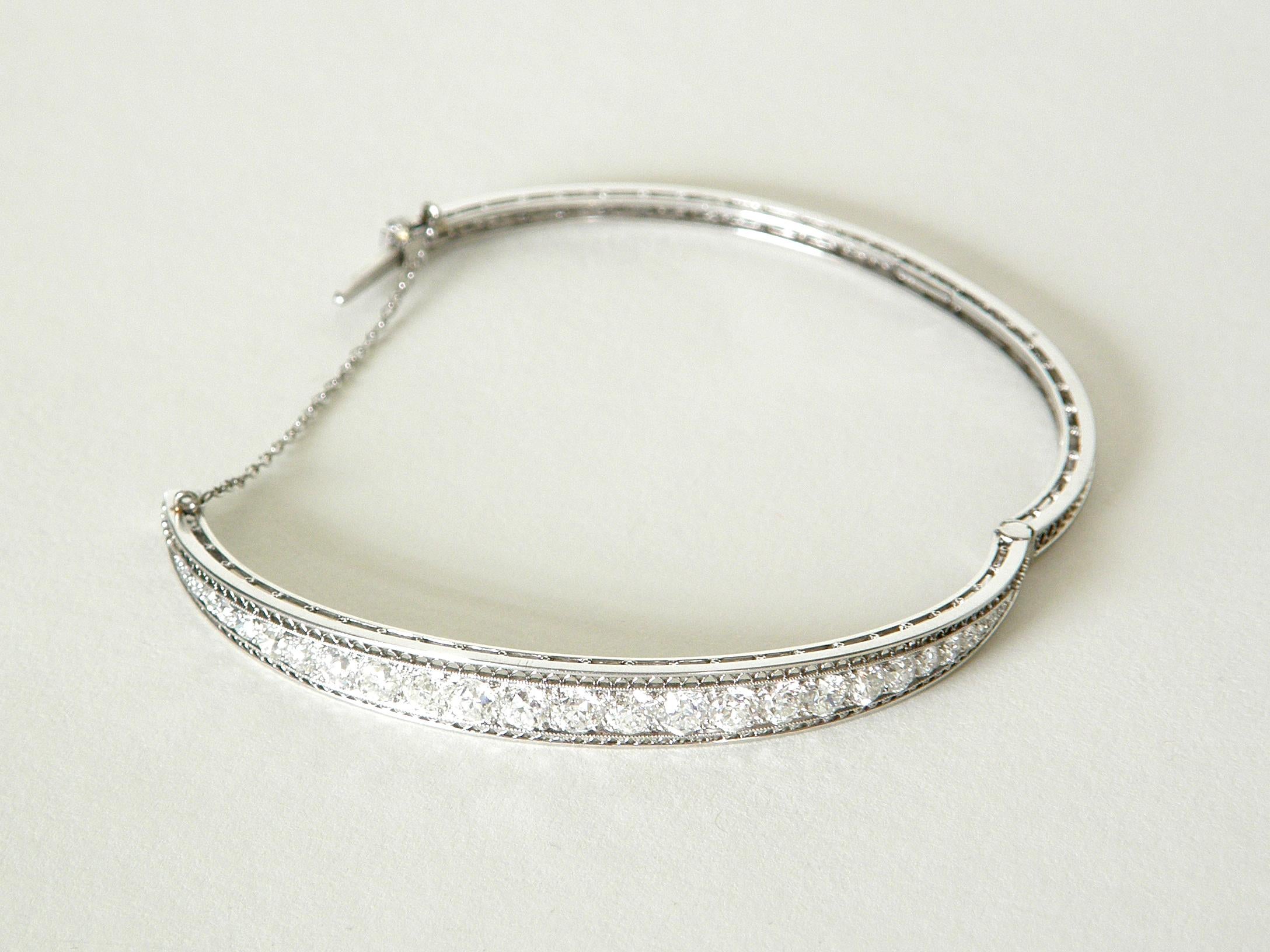 This diamond and platinum, art deco era bracelet from Tiffany & Co. is perfectly elegant. The refined design places the focus on the diamonds, allowing them to shine and beautifully accent the wrist of the wearer. 

The circa 1920s or 1930s hinged,