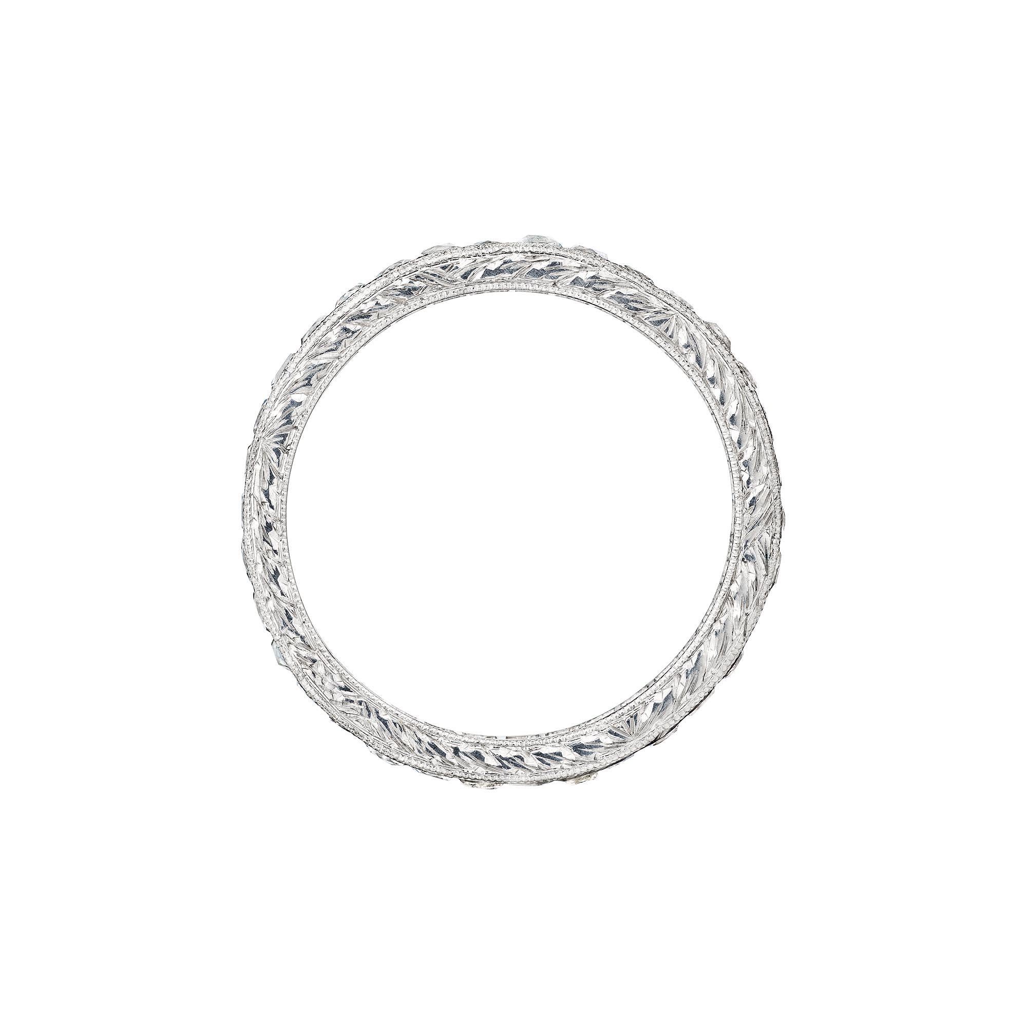 Circle yourself in light with this enchanting Tiffany & Co. art deco French cut diamond platinum eternity band ring.  Signed.  Circa 1930.  Total approximate diamond weight is 1.75 carats.  F-H color.  VS1-2 clarity.  Size 6 1/2.