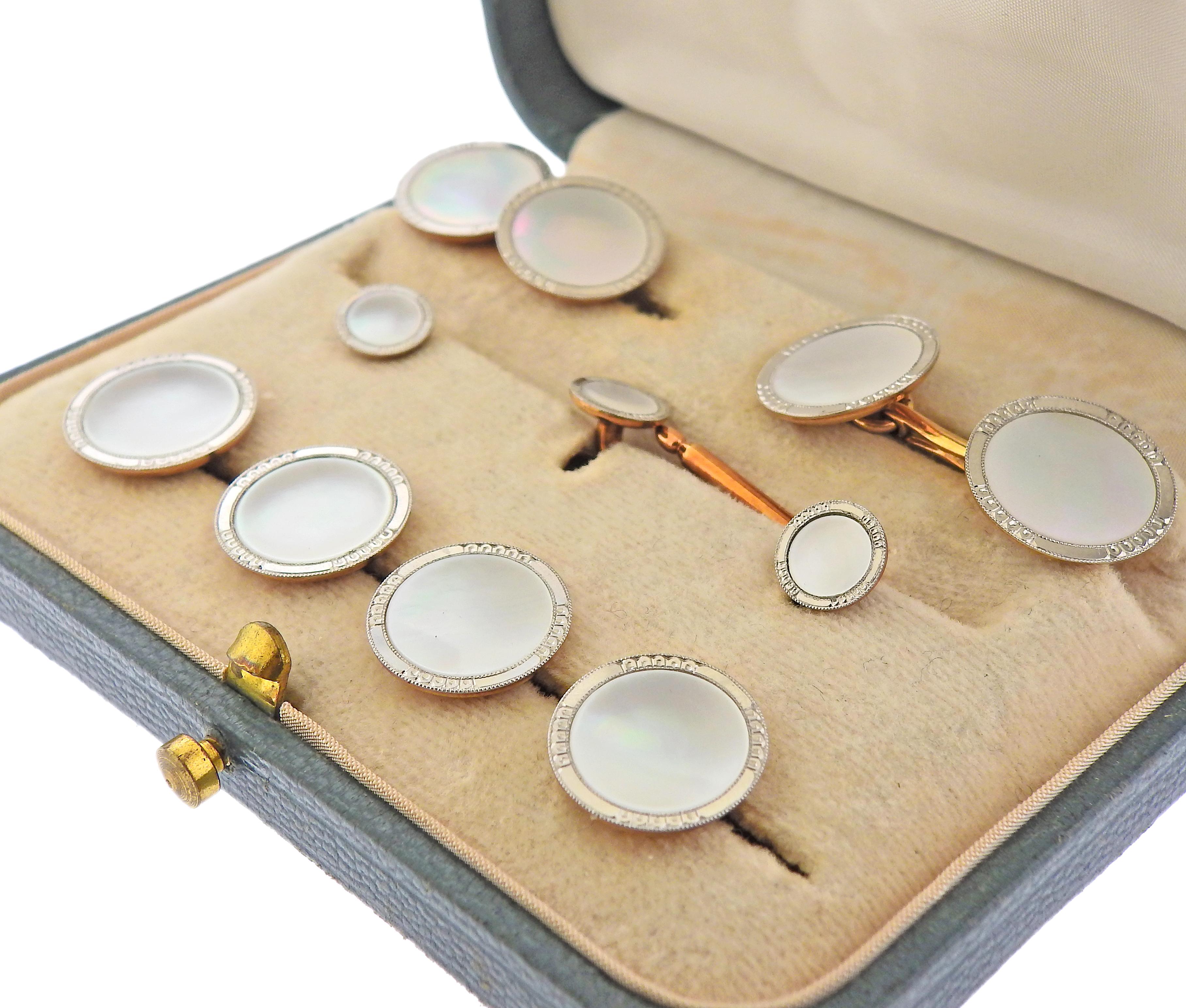 Art Deco 14k gold and platinum top dress cufflinks & studs set, by Tiffany & Co, in original fitted box. Adorned with mother of pearl. Cufflink top is 15mm in diameter, stud - 7mm. Marked: Tiffany & Co (cufflinks hardware only), 14k Plat, , c14.