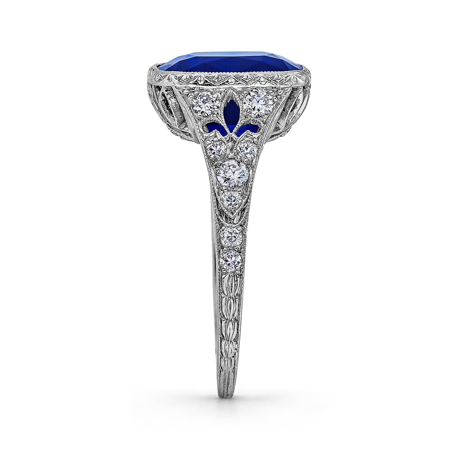 The ultimate in grace and elegance this Tiffany & Co. Art Deco Natural Kashmir antique cushion cut sapphire diamond and platinum ring is simply breathtaking. With a wearable proportion and a rich velvet blue color, the estimated 5.00 carat center
