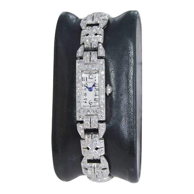 FACTORY / HOUSE: International Watch Co. / Tiffany & Co.
STYLE / REFERENCE: Art Deco 
METAL / MATERIAL: Platinum
CIRCA / YEAR: Art Deco / 1930's
DIMENSIONS / SIZE: 28mm x 11mm
MOVEMENT / CALIBER: Manual Winding / 17Jewels 
DIAL / HANDS: Eggshell