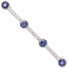 Tiffany & Co, Art Deco Platinum, Sapphires and Round Diamonds Brooch, circa 1925