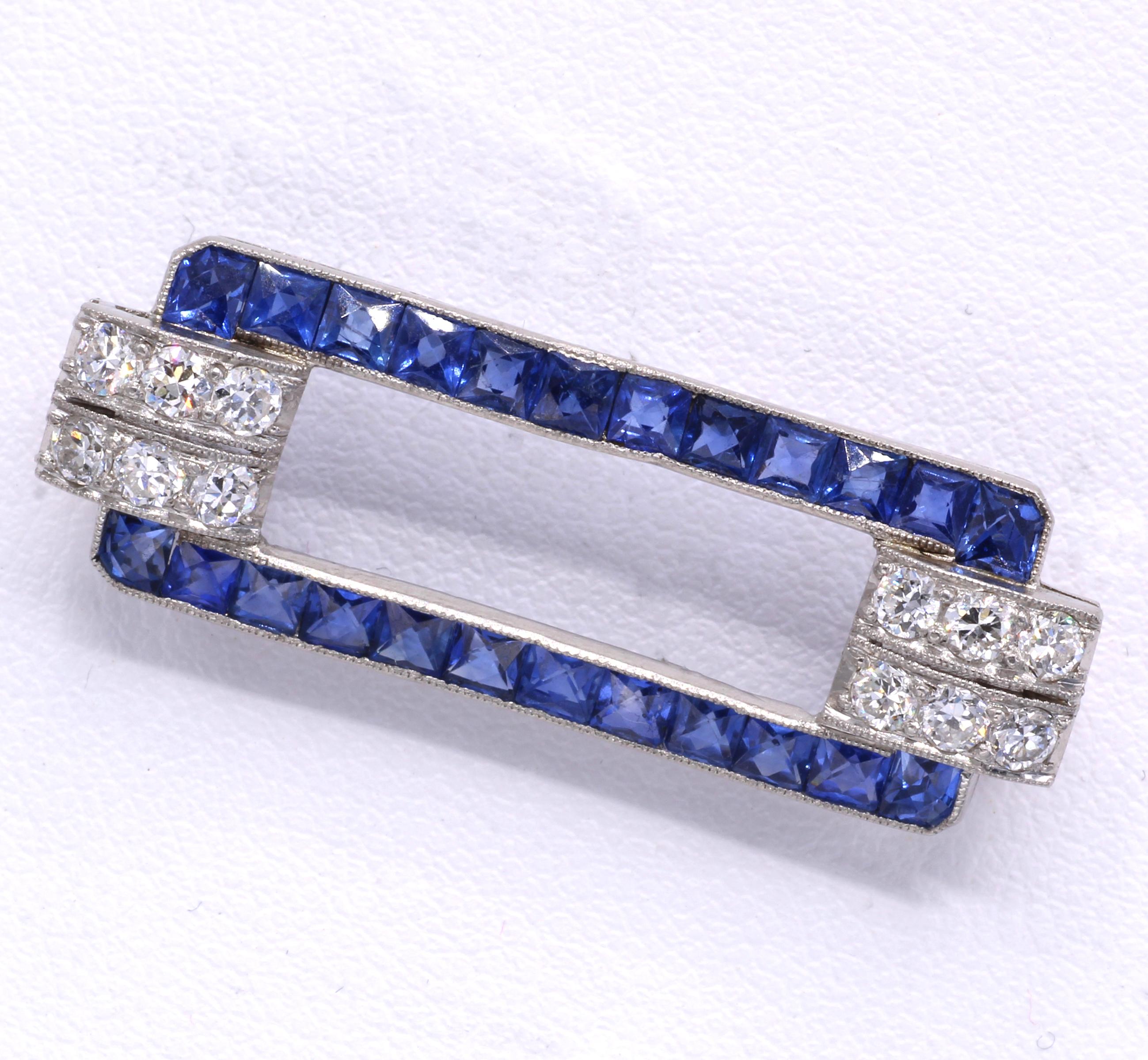 Masterfully handcrafted by Tiffany & Co this Art Deco brooch from ca 1925 is set with 24 perfectly matched cornflower blue french-cut sapphires channel set within a platinum bezel. Either end of the brooch is embellished by 6 also perfectly matched