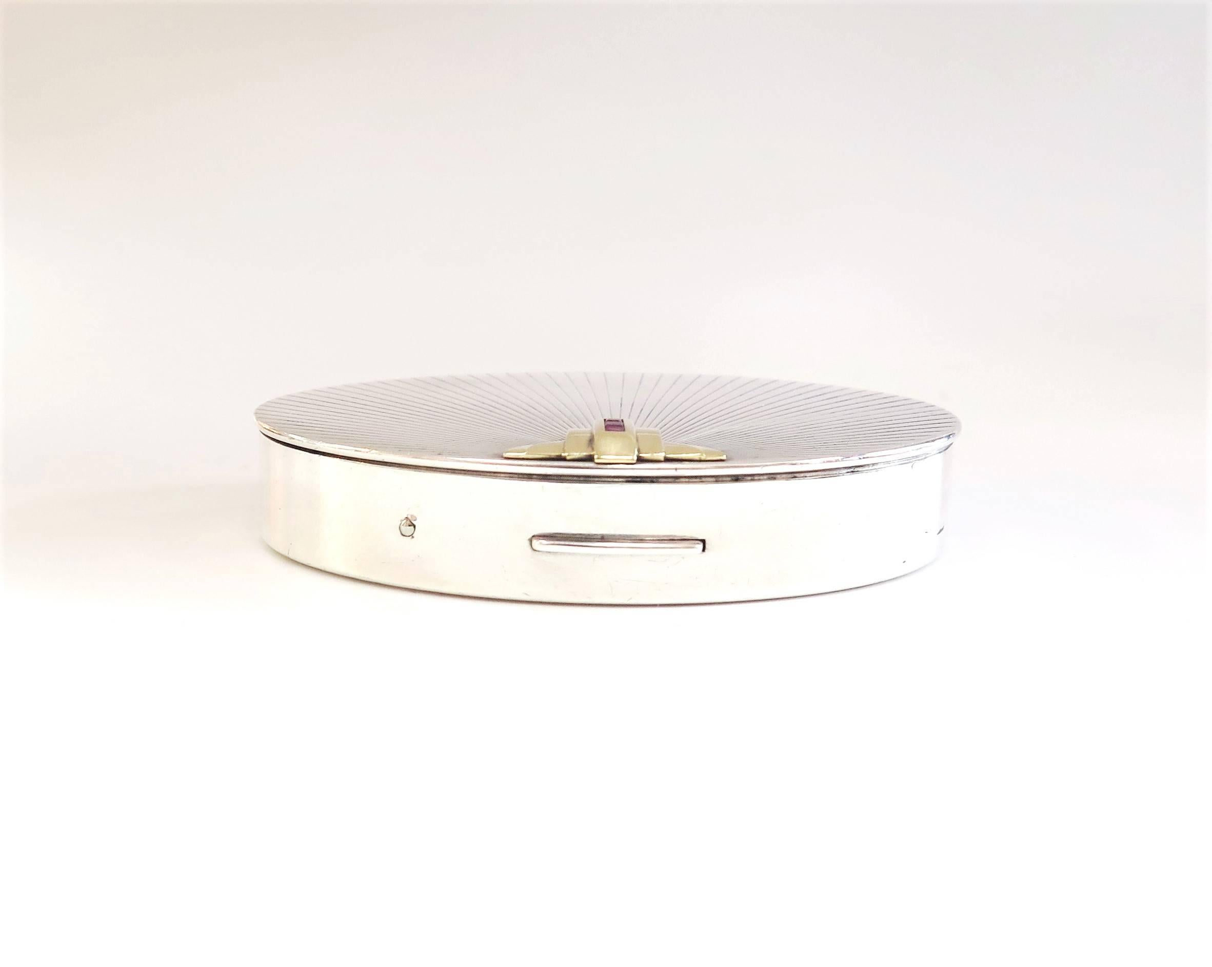 Some brands are just iconic, and of course, Tiffany & Co. is one of them…known for quality jewelry and luxury home goods, this Art Deco compact is no exception. Marked Tiffany & Co. Sterling Silver 14K, this gorgeous compact features an engraved