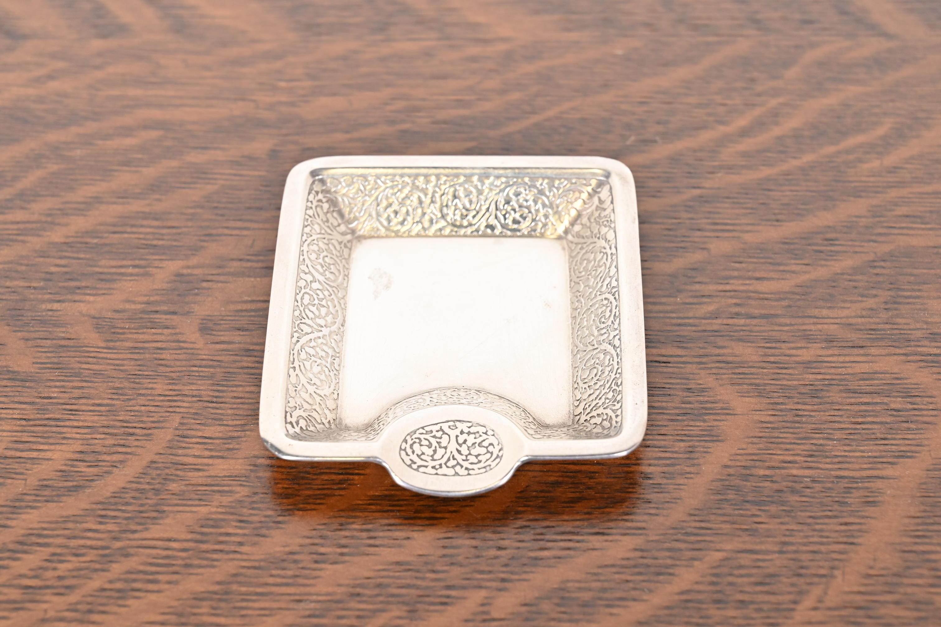 A gorgeous antique sterling silver ashtray or catchall tray

By Tiffany & Co. (signed to the underside)

USA, Circa Early 20th Century

Measures: 3.25