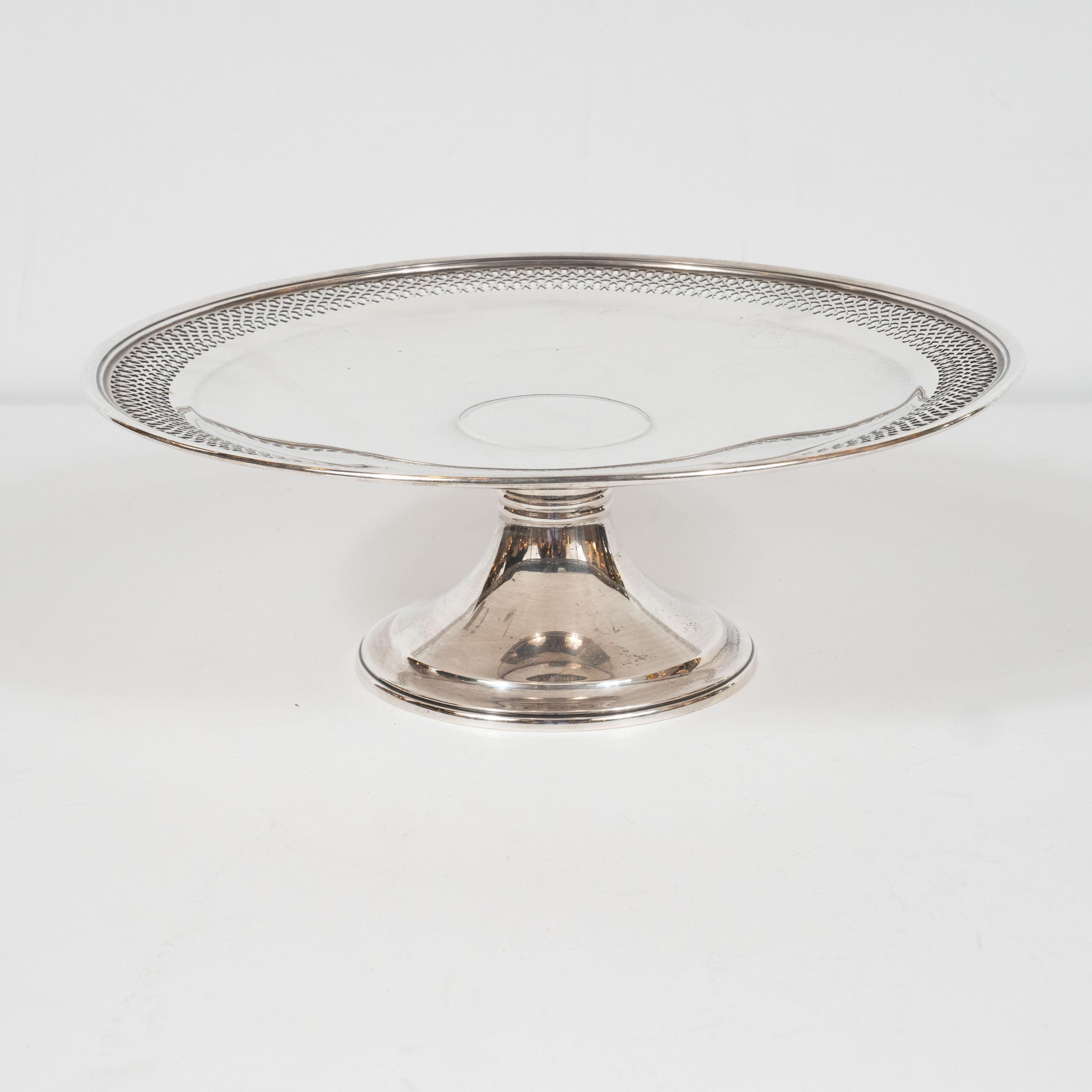 This elegant sterling silver tazza was realized by Tiffany & Co. one of America's premiere luxury makers of sterling silver and other precious objects since 1837. Designed by Tiffany & Co. in the United States, this piece embodies the timeless