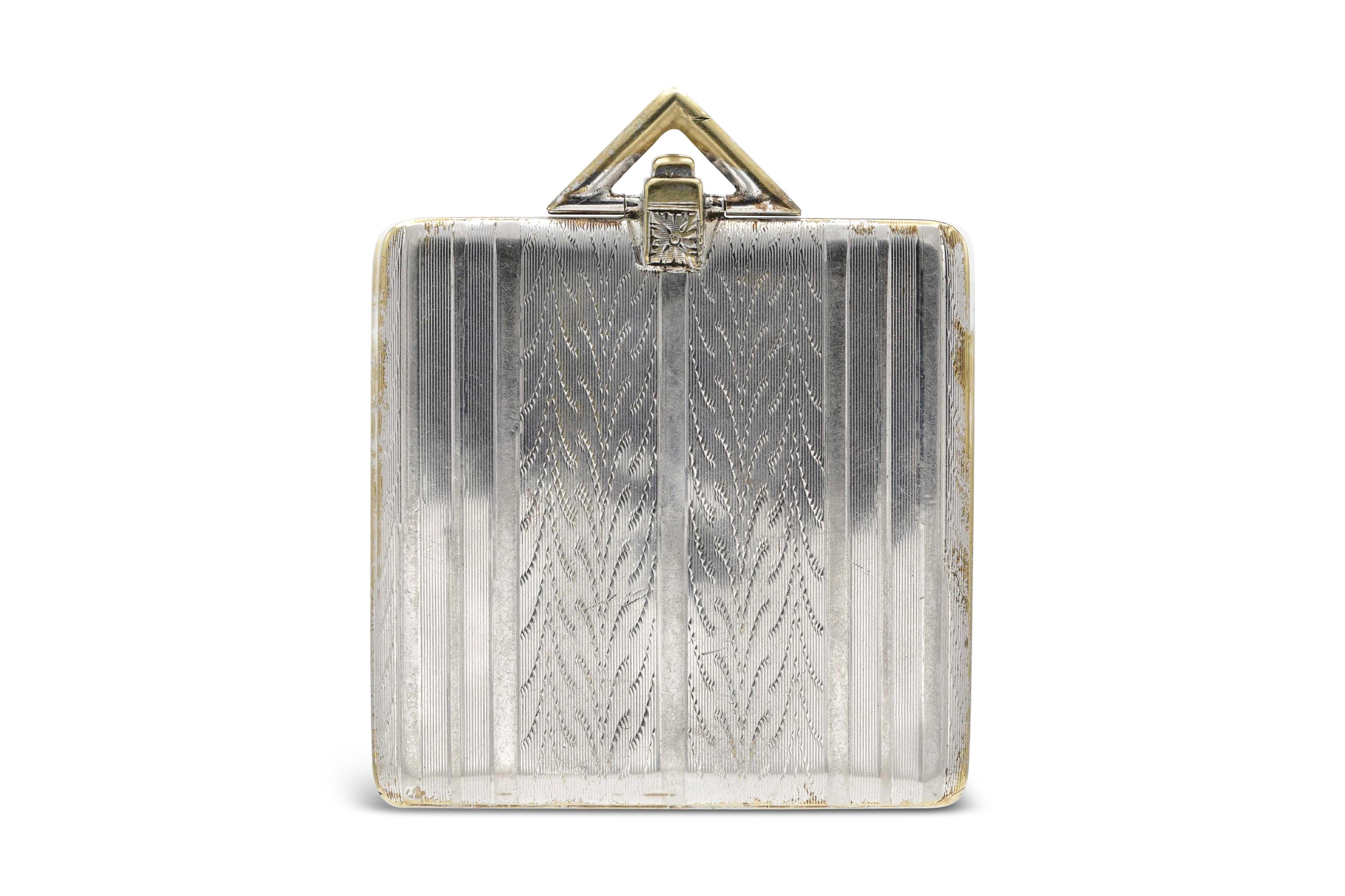 Finely crafted in 14k white gold.
Signed by Tiffany & Co.
Art Deco, circa 1920s
1 5/8