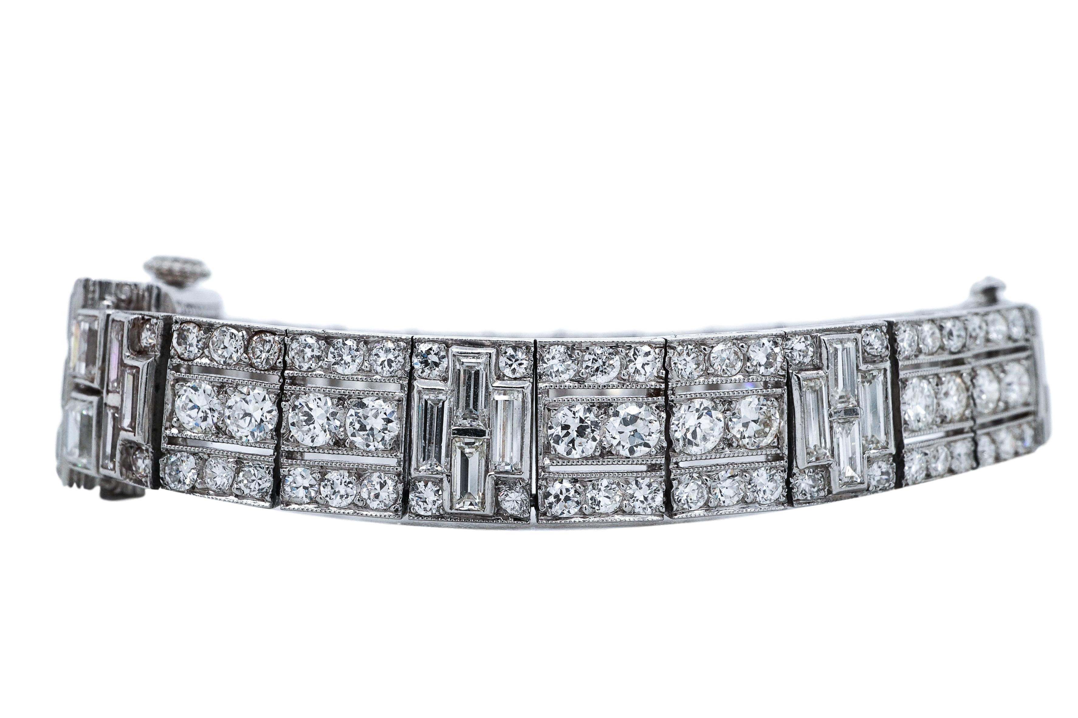 Tiffany & Co Art Deco Wrist Watch featuring square, baguette and old-cut diamonds. With a platinum and gold body, this wrist watch also features manual movement, and has a case width of 13.18 mm, 7 ins., established circa 1930, this beauty is signed