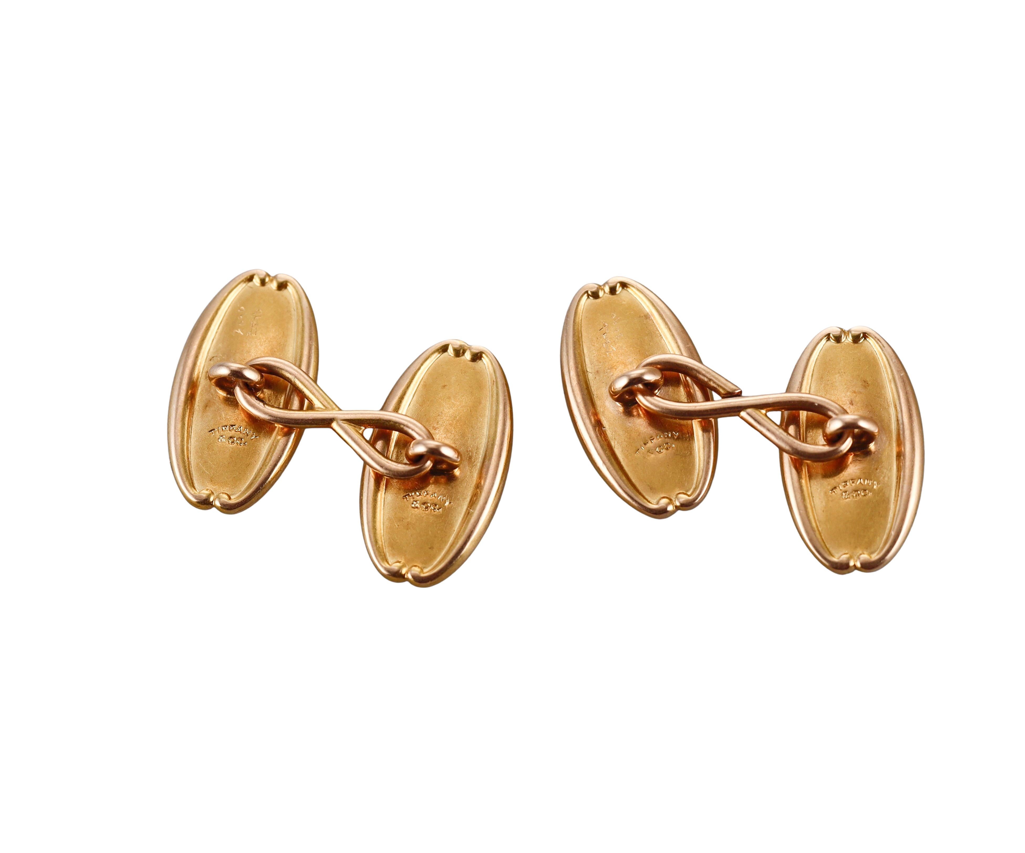 Pair of Art Nouveau antique 14k yellow gold cufflinks by Tiffany & Co. Each top is 21mm x 12mm. Marked: Tiffany & Co. Weight - 12.7 grams. 