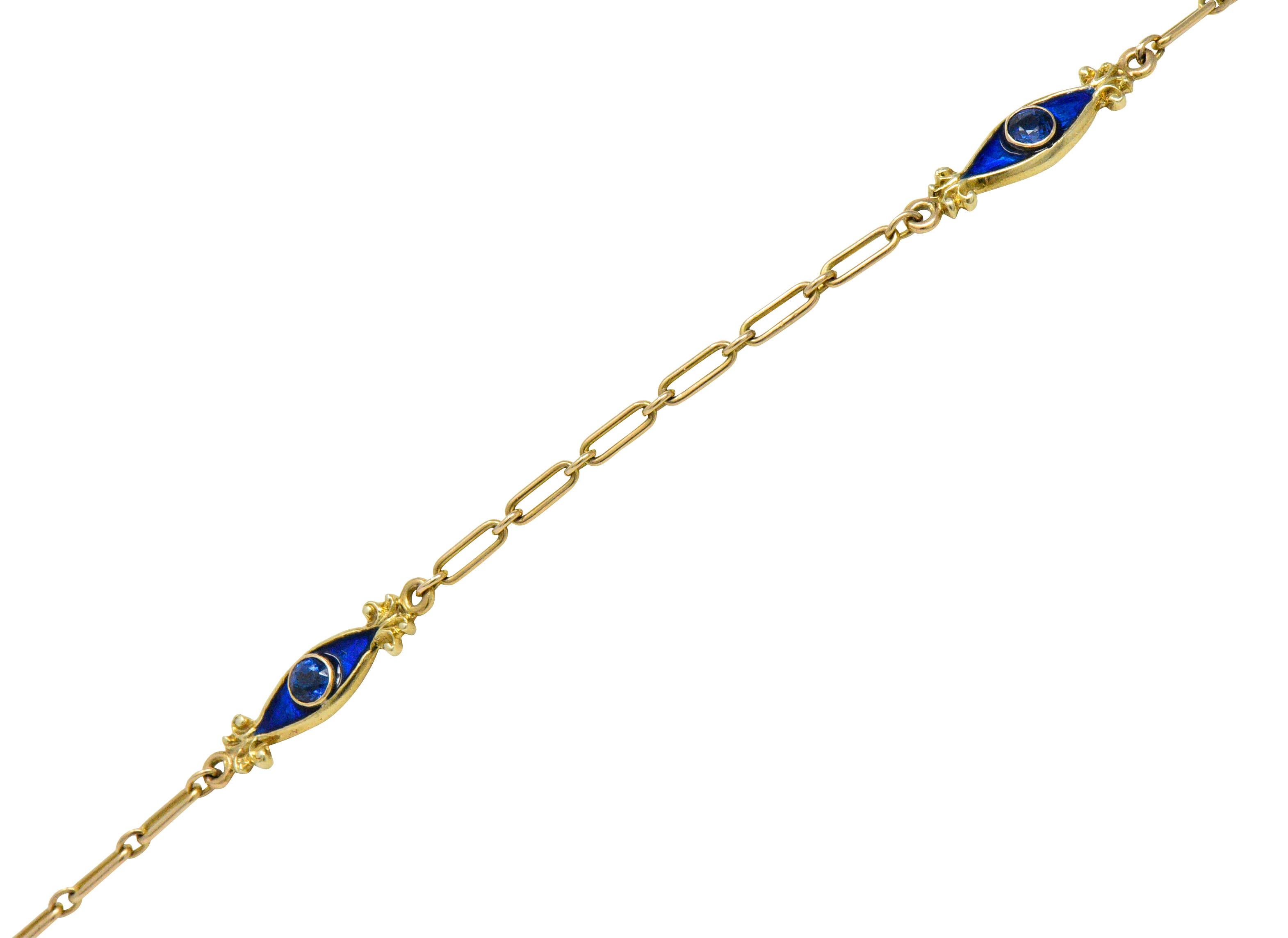 Featuring a removable ladies dress watch set throughout with round cut sapphires

Suspended from a sapphire set bail and articulated surmount with scrolling detail

On an elongated cable chain with six navette stations, each centering a round cut