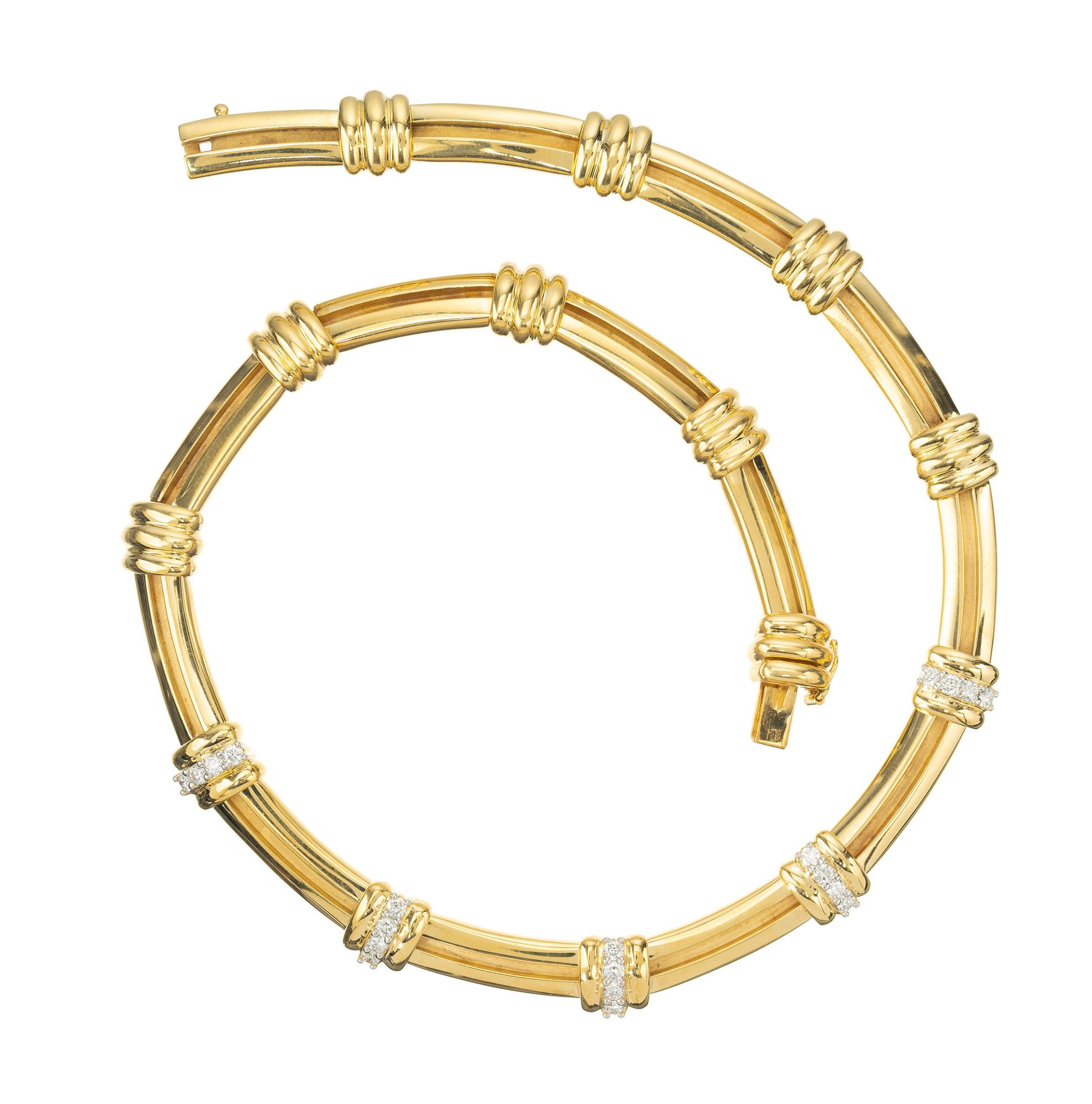 Elegantes, flexibles Tiffany & Co Atlas-Gliedercollier aus 18 Karat Gelbgold mit Platinabschnitten, akzentuiert mit 20 runden Diamanten im Vollschliff mit einem Gesamtgewicht von 1,00cts. Die Diamanten sind mit Zacken aus Platin befestigt. 16 Zoll