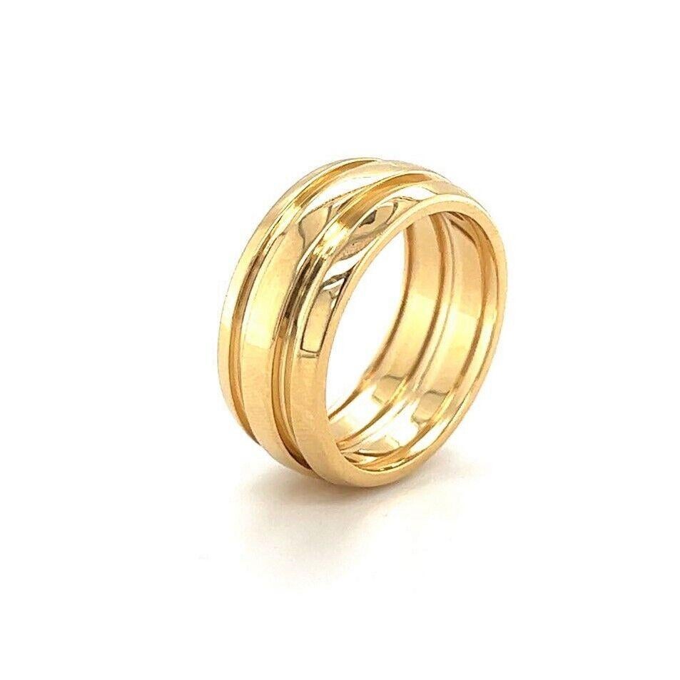 Tiffany & Co. Atlas 18k Yellow Gold Grooved Wide Band Ring Size 7.75

Condition:  Excellent Condition, Professionally Cleaned and Polished
Metal:  18k Gold (Marked, and Professionally Tested)
Weight:  11g
Width:  8.5mm
Size:  7.75
Markings: 