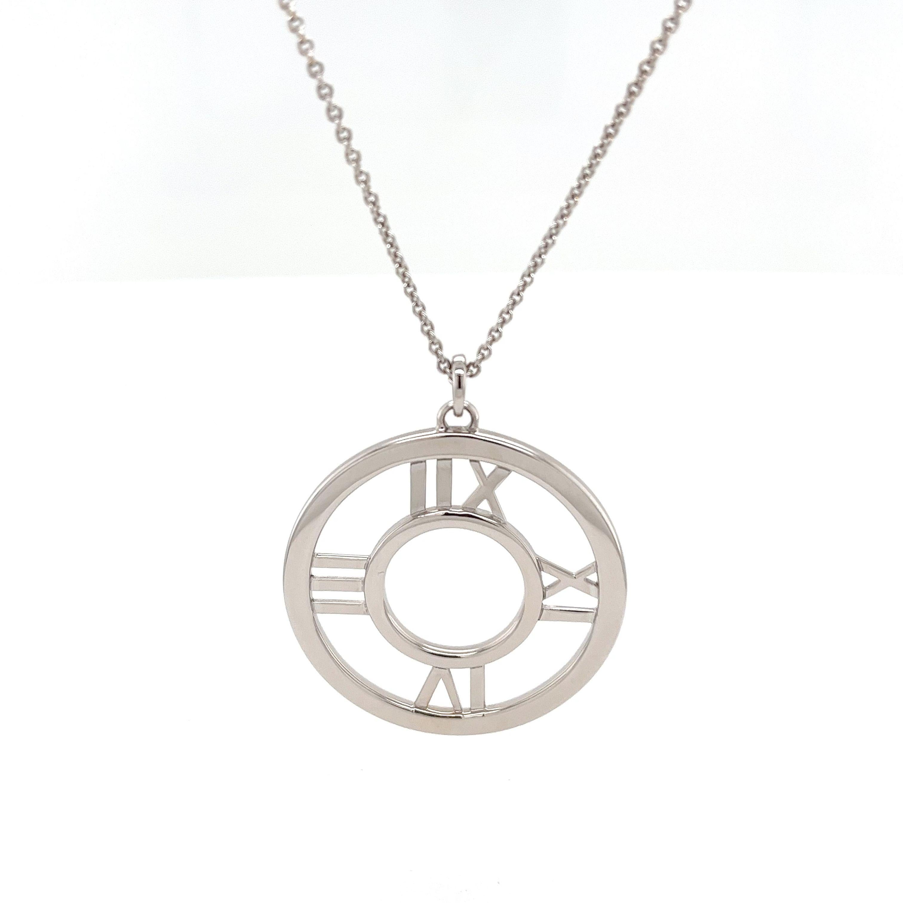 This Tiffany & Co. 18ct white gold circle pendant offers an understated yet chic accessory option that makes a statement without saying a word.  It's the ideal present for someone special or as a treat for yourself.

•	Total  Weight: