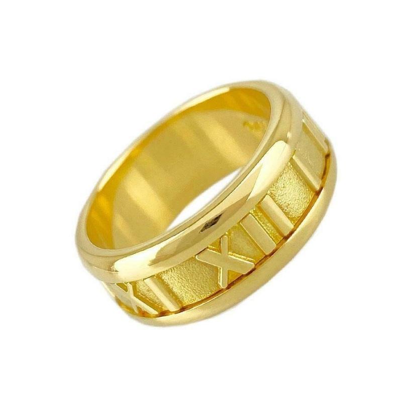 TIFFANY & CO. Atlas 18K Gold 7mm Wide Numeric Ring 5

Metal: 18K Yellow Gold
Size: 5 
Band Width: 7mm
Weight: 8.0 grams
Hallmark: TIFFANY&CO. © 1995 750 ITALY
Condition: Excellent condition

Limited edition, no longer available for sale in Tiffany