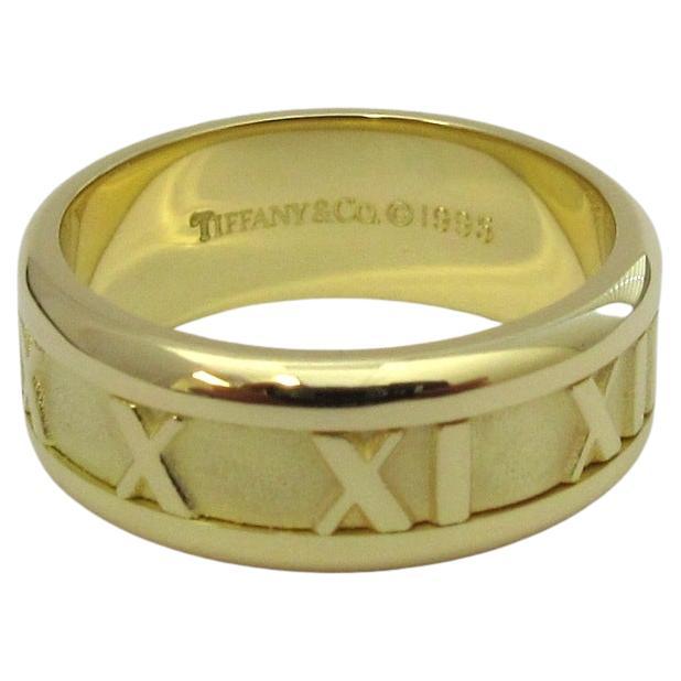 TIFFANY
Co. Anello numerico Atlas in oro 18 carati largo 7 mm 6