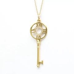 TIFFANY & Co. Atlas 18K Gold Diamond Key Pendant Necklace