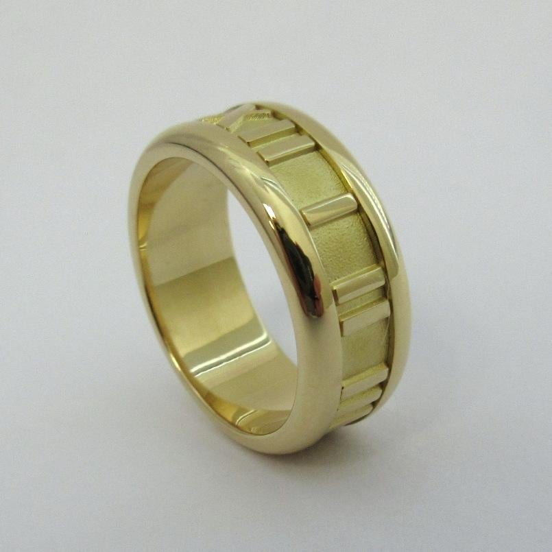 TIFFANY & CO. Atlas 18K Gold Numeric Ring 5.5

Metal: 18K Yellow Gold
Size: 5.5 
Band width: 7mm
Weight: 7.90 grams
Hallmark: TIFFANY&CO. © 1995 750 ITALY
Condition: Excellent condition

Limited edition, no longer available for sale in Tiffany