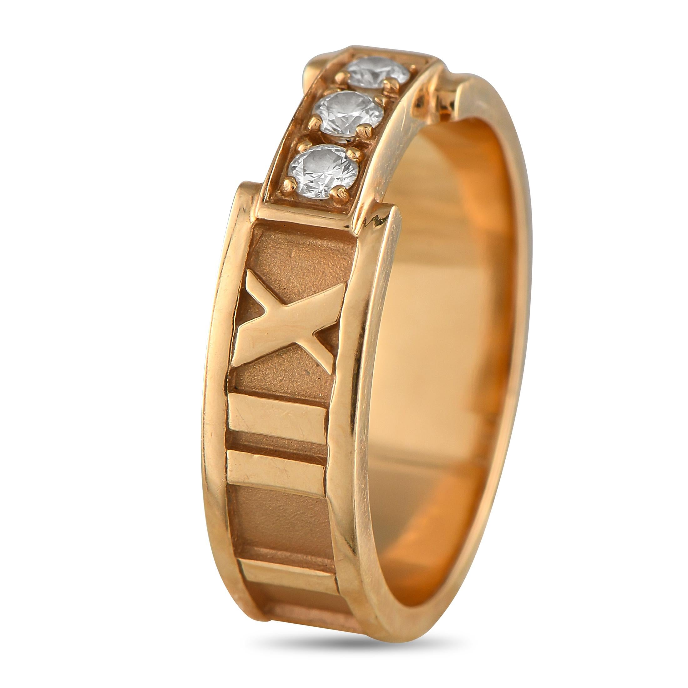 Like all pieces from the Tiffany & Co. Atlas collection, this ring features luxury brands instantly recognizable Roman numeral motifs. A trio of Diamonds totaling 0.15 carats add sparkle to the center of the detailed 18K Rose Gold band. Ideal for
