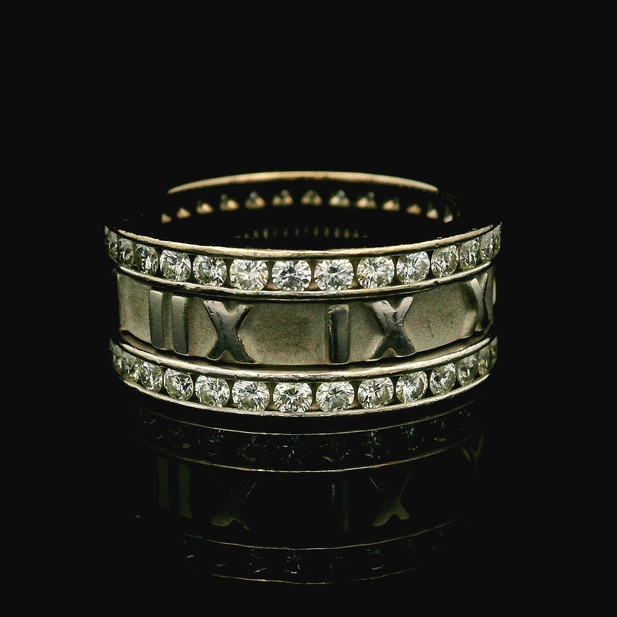 –Stone(s)–
(64) Natural Genuine Diamonds - Round Brilliant Cut - Channel Set - G/H  Color - VS1/VS2 Clarity - 1.60ctw (approx.)

Material: 18k White Gold
Weight: 12.01 Grams
Ring Size: 6.0 ( fitted on finger, we can NOT custom size this ring)
Ring