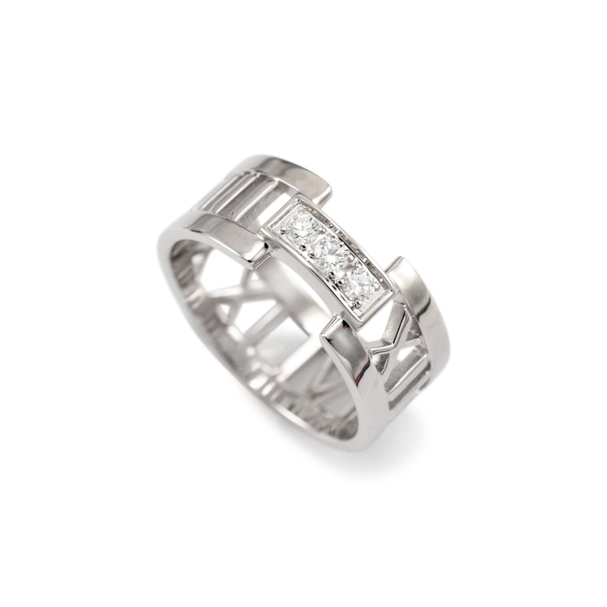 Brand: Tiffany & Co.

Gender: Ladies 

Metal Type: 18K White Gold

Ring Size: 6.5

Width: 8.00 mm

Weight: 5.59 grams

One ladies 18K White Gold diamond wedding band with a soft-square shank. The metal was tested and determined to be 18K white gold.