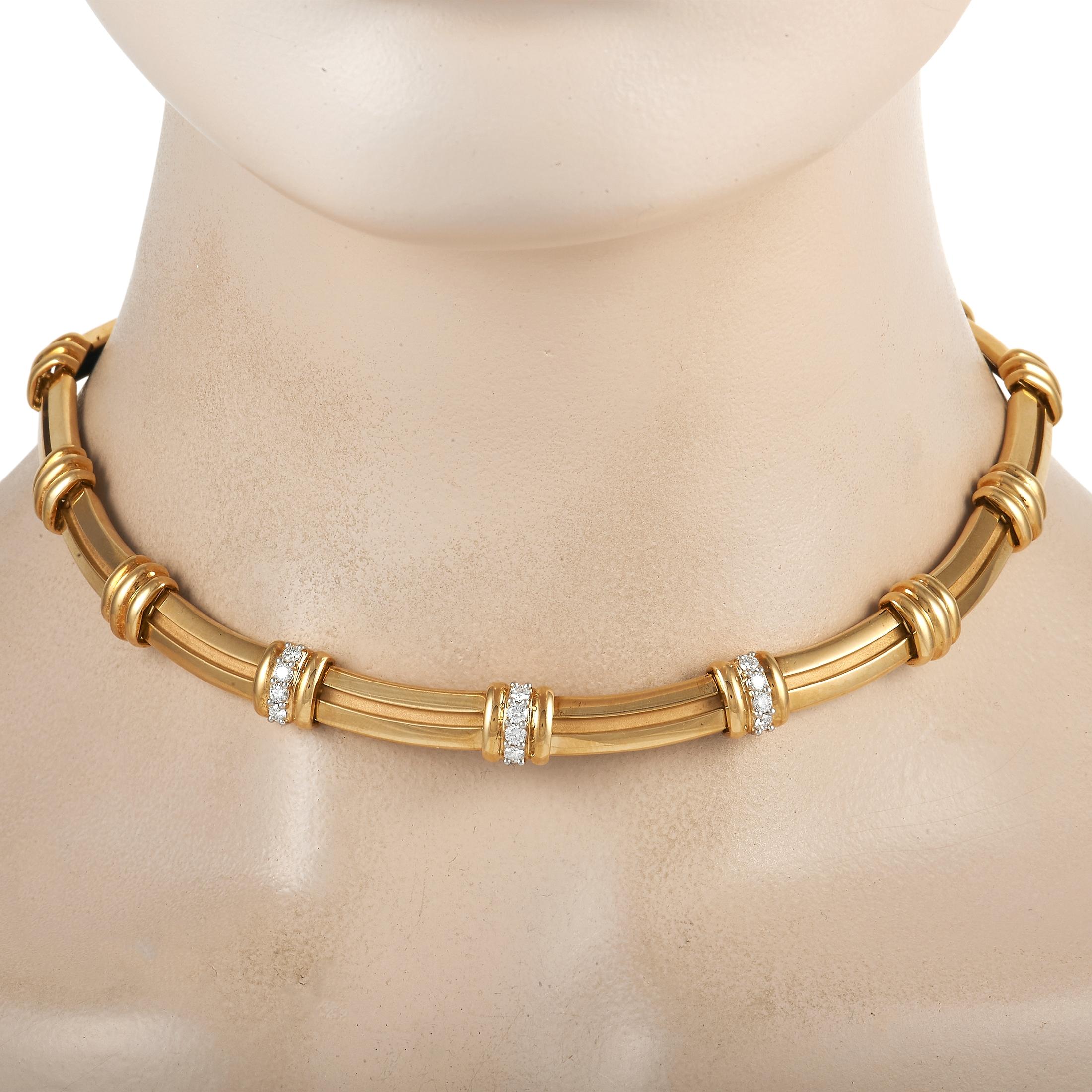 Making a stylish statement is as easy as slipping on this bold, breathtaking Tiffany & Co. Atlas necklace. A 14” long design crafted entirely from 18K Yellow Gold, the central links are accented by glittering diamonds with a total weight of 0.95