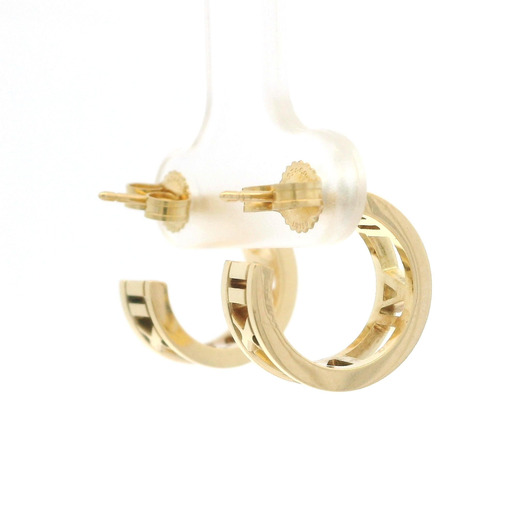Material: Solid 18k Yellow Gold
Weight: 5 Grams
Backing: Posts w/ Butterfly Closures (pierced ears are required)
Front Width: 5.3mm (0.20