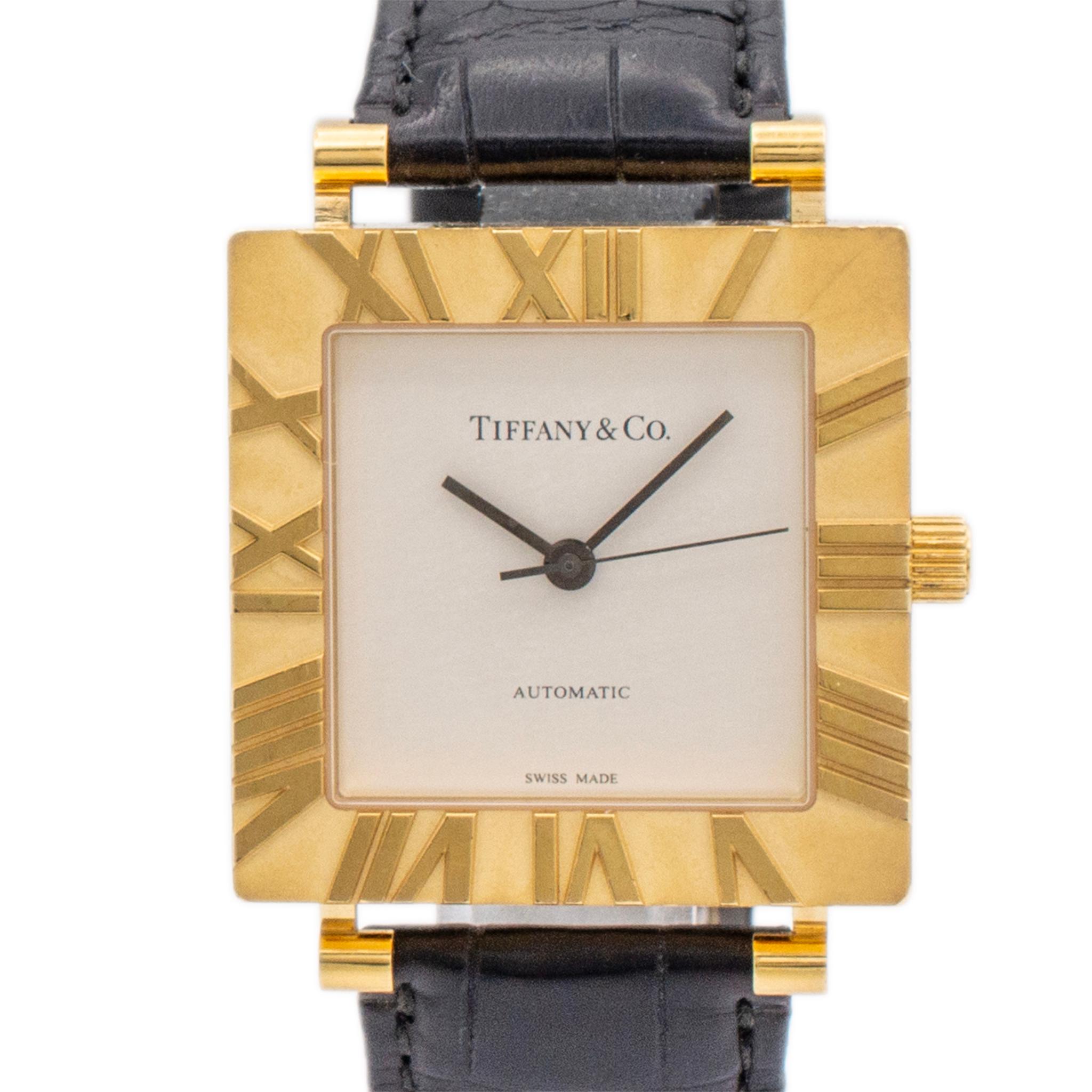 Brand: Tiffany & Co.

Gender: Unisex

Metal Type: 18K Yellow Gold

Diameter: 34.00 mm

Weight: 88.76 Grams

18K yellow gold Swiss made watch with original box. The metal was tested and determined to be 18K yellow gold. Engraved with 