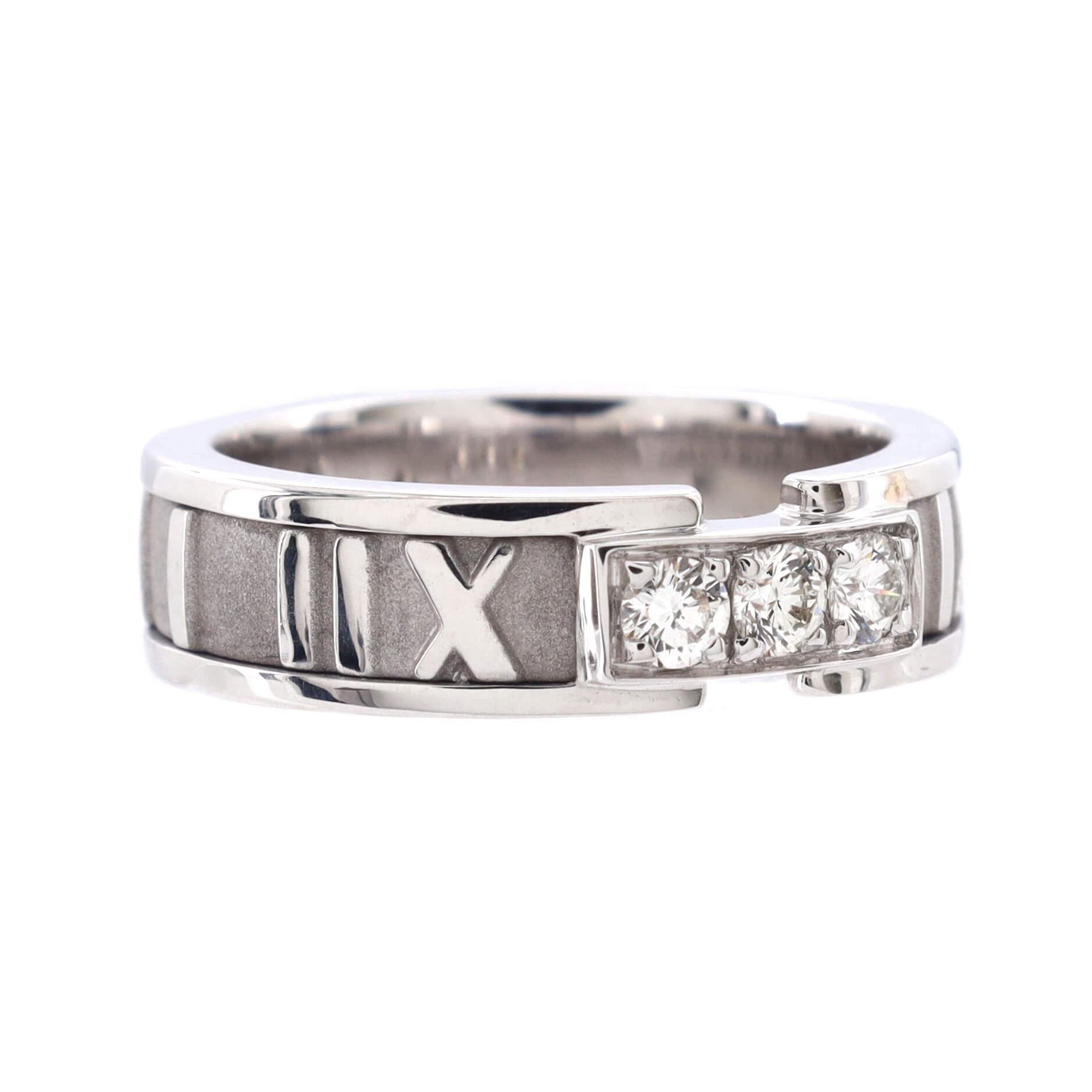 Condition: Very good. Moderate wear and re-polishing throughout.
Accessories: No Accessories
Measurements: Size: 5, Width: 5.35 mm
Designer: Tiffany & Co.
Model: Atlas Band Ring 18K White Gold with Diamonds
Exterior Color: White Gold
Item Number: