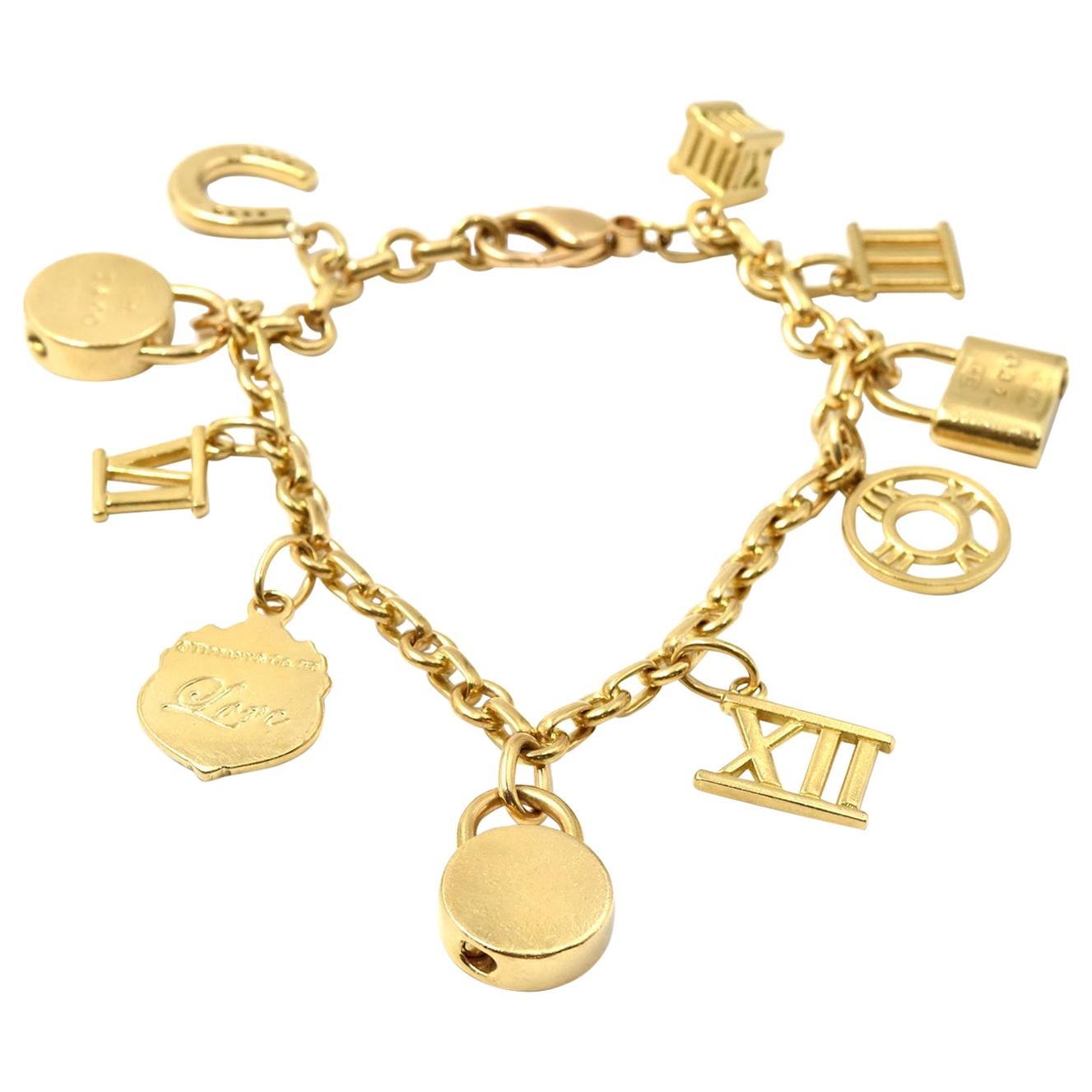 Tiffany & Co Heart with Cupid's Arrow Gold Charm Bracelet | Pampillonia  Jewelers | Estate and Designer Jewelry