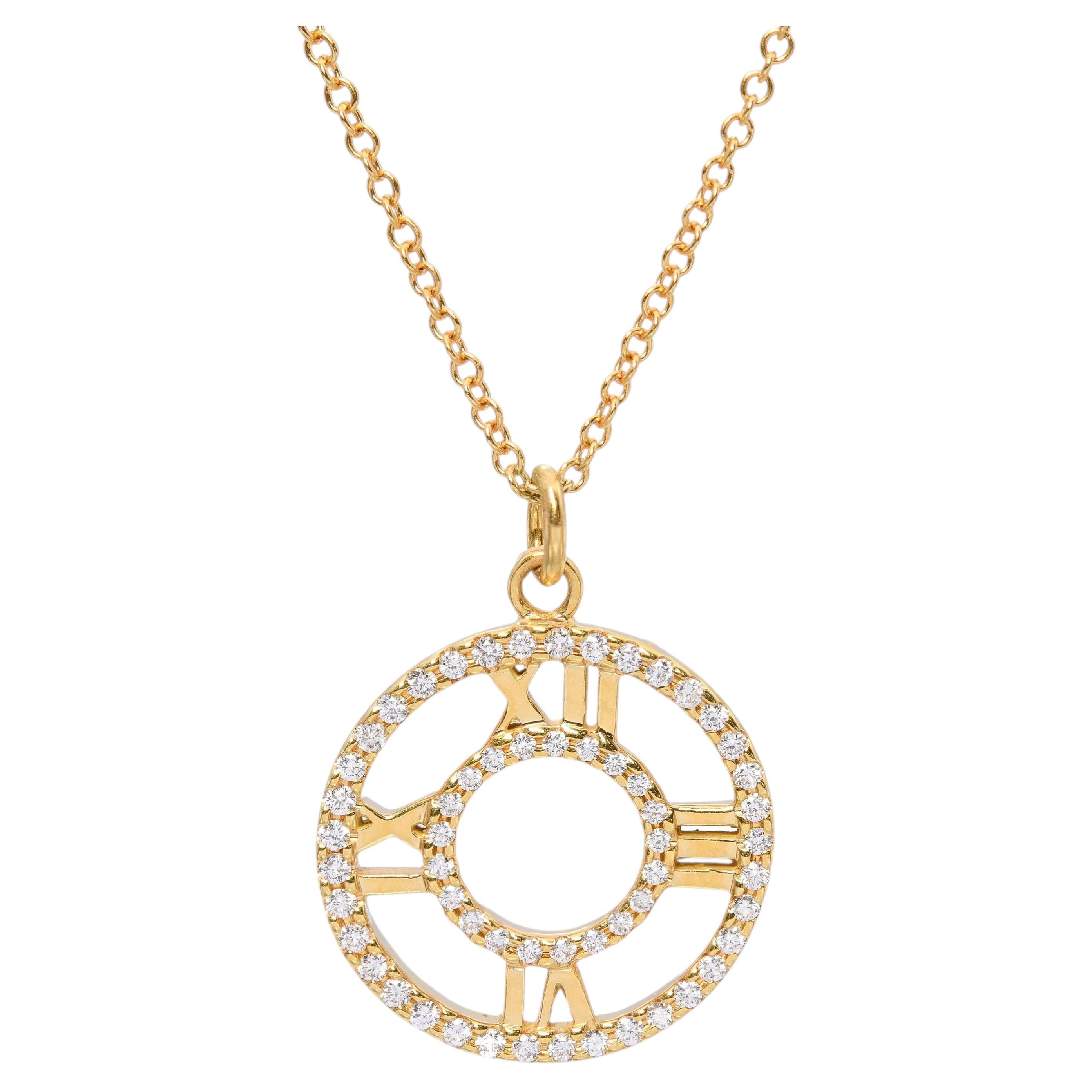 Tiffany & Co. Collier « Atlas Collection » avec médaillon en or jaune 18 carats serti de diamants