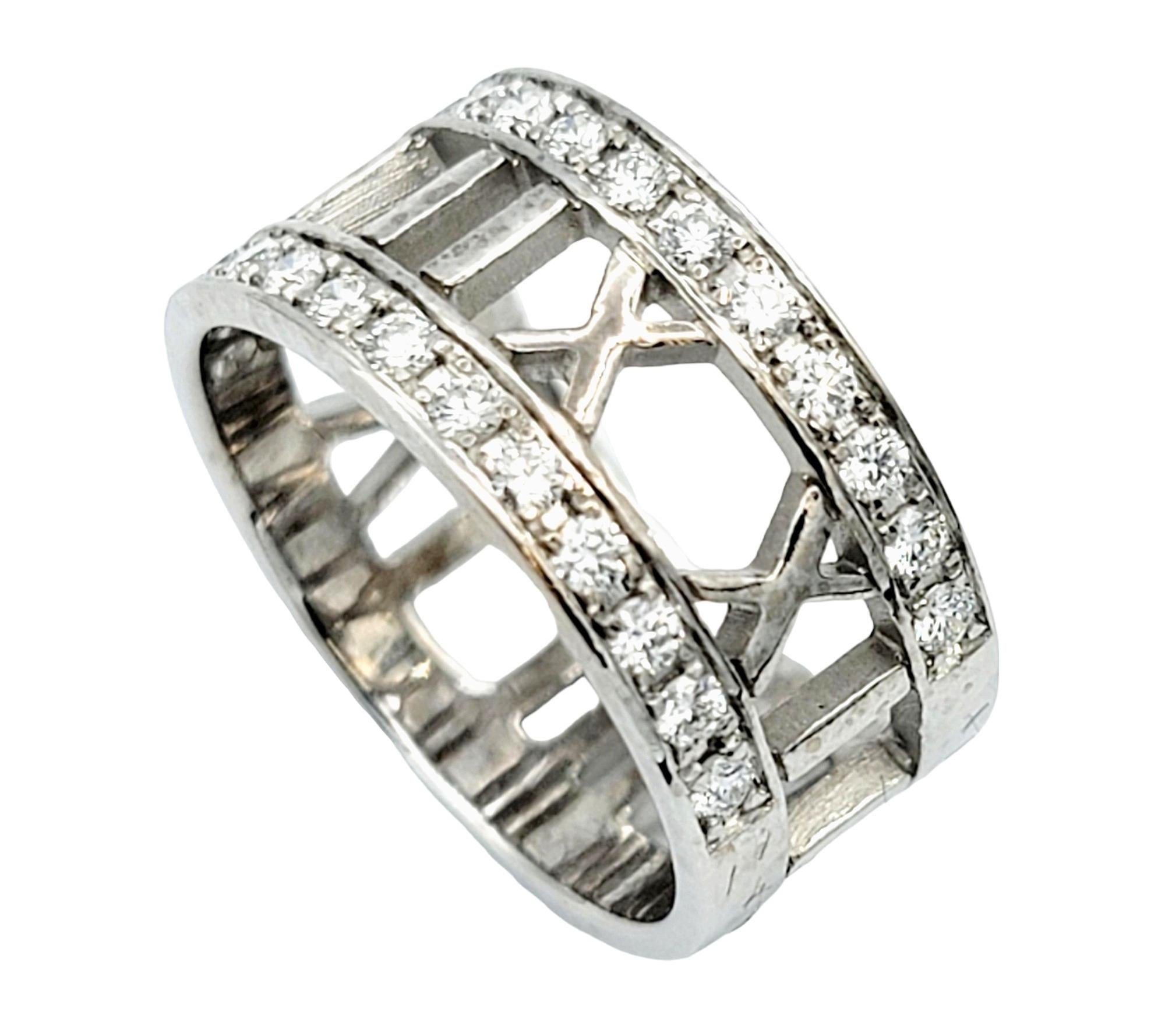 Ring size: 5.5

Sophisticated and stunning Tiffany & Co. Atlas Collection band ring with diamonds. Founded in 1837 in New York City, Tiffany & Co. is one of the world's most storied luxury design houses recognized globally for its innovative jewelry