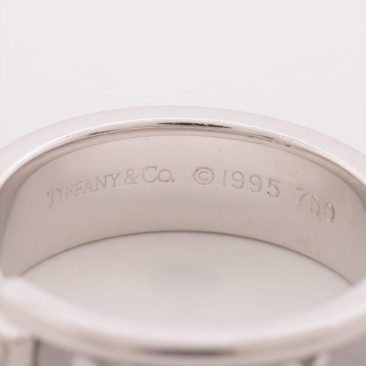 The Tiffany & Co. Atlas Diamond Ring in white gold is a striking piece that blends modern design with classic elegance.Crafted from high-quality white gold, the ring are part of the Atlas Collection, known for its contemporary yet classic design