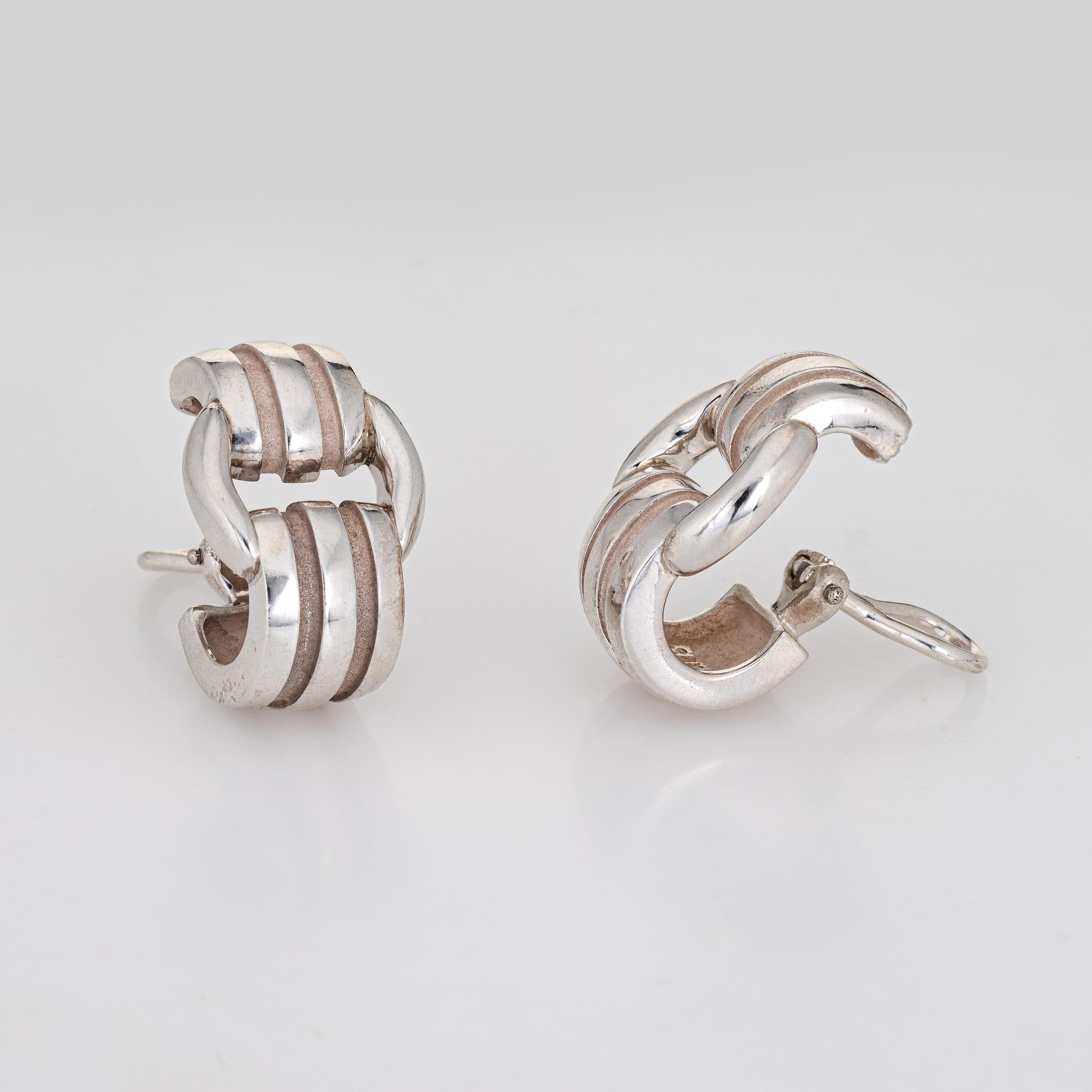 Finely detailed pair of vintage Tiffany & Co Atlas earrings (circa 1995) crafted in sterling silver. 

From the popular Atlas collection, the stylish earrings are crafted in sterling silver. The retired earrings are no longer available for sale at