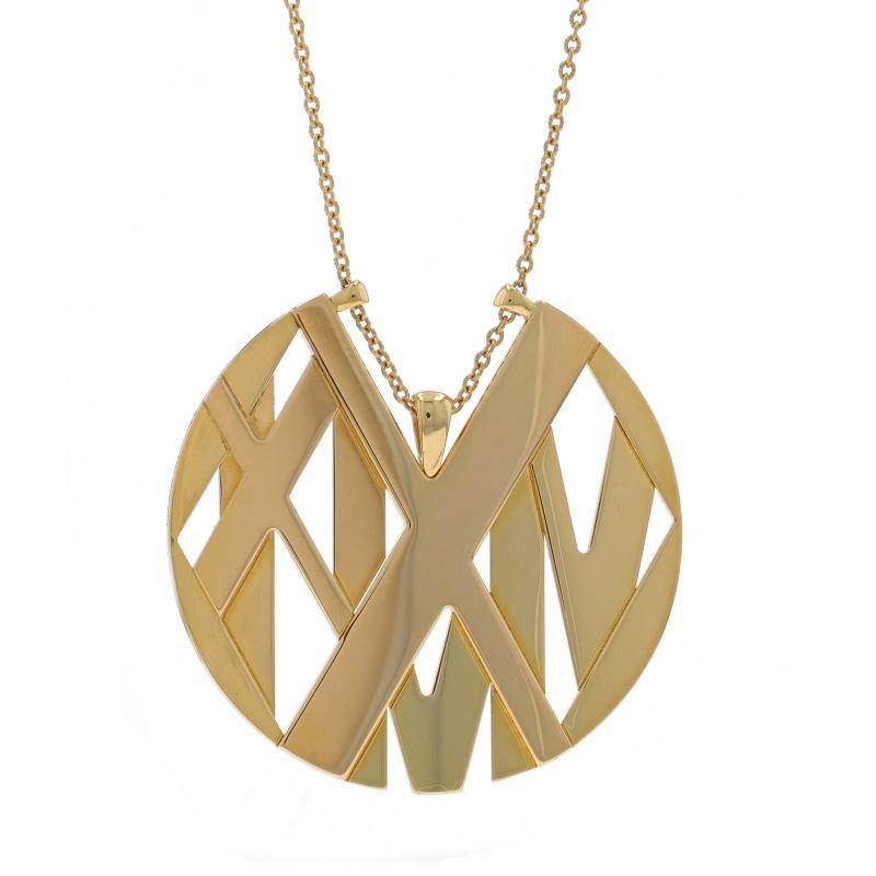 Marque : Tiffany & Co.
Collectional : Atlas
Design :  Grand disque

Contenu du métal : Or jaune 18k

Style de chaîne : Câble
Style du collier : Chaîne
Type de fermeture : Fermoir à anneau à ressort

Mesures

Point 1 : Pendentif
Hauteur (à partir de