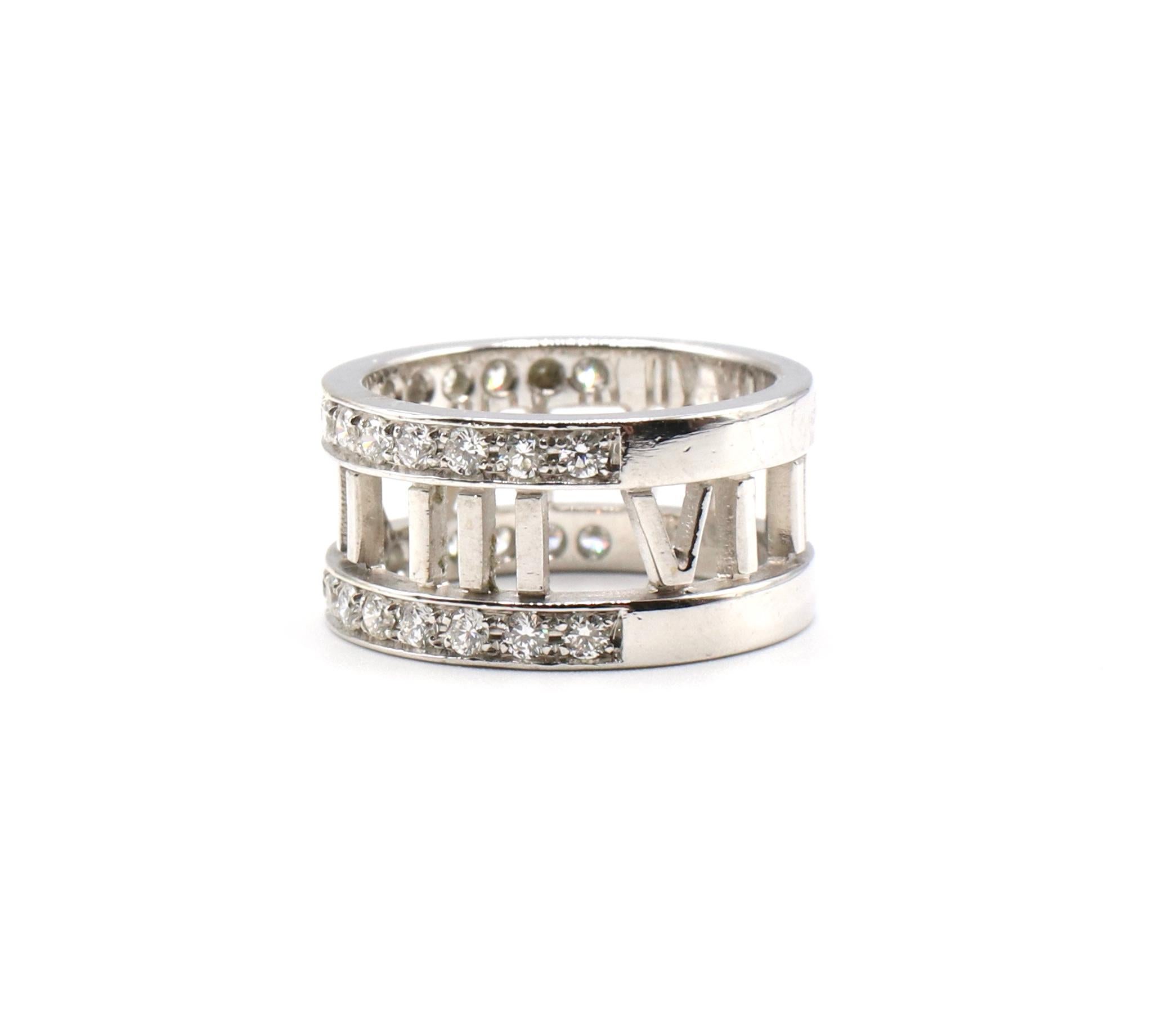 Tiffany & Co. Atlas 18k White Gold Diamond Band Ring Size 4

Metal: 18k white gold
Weight:  6.38 grams
30 Round brilliant cut diamonds approximately 0.50ctw go half way around the ring
Color: F-G
Clarity: VS
Size 4
Band is approx. 9mm wide
Stamped: