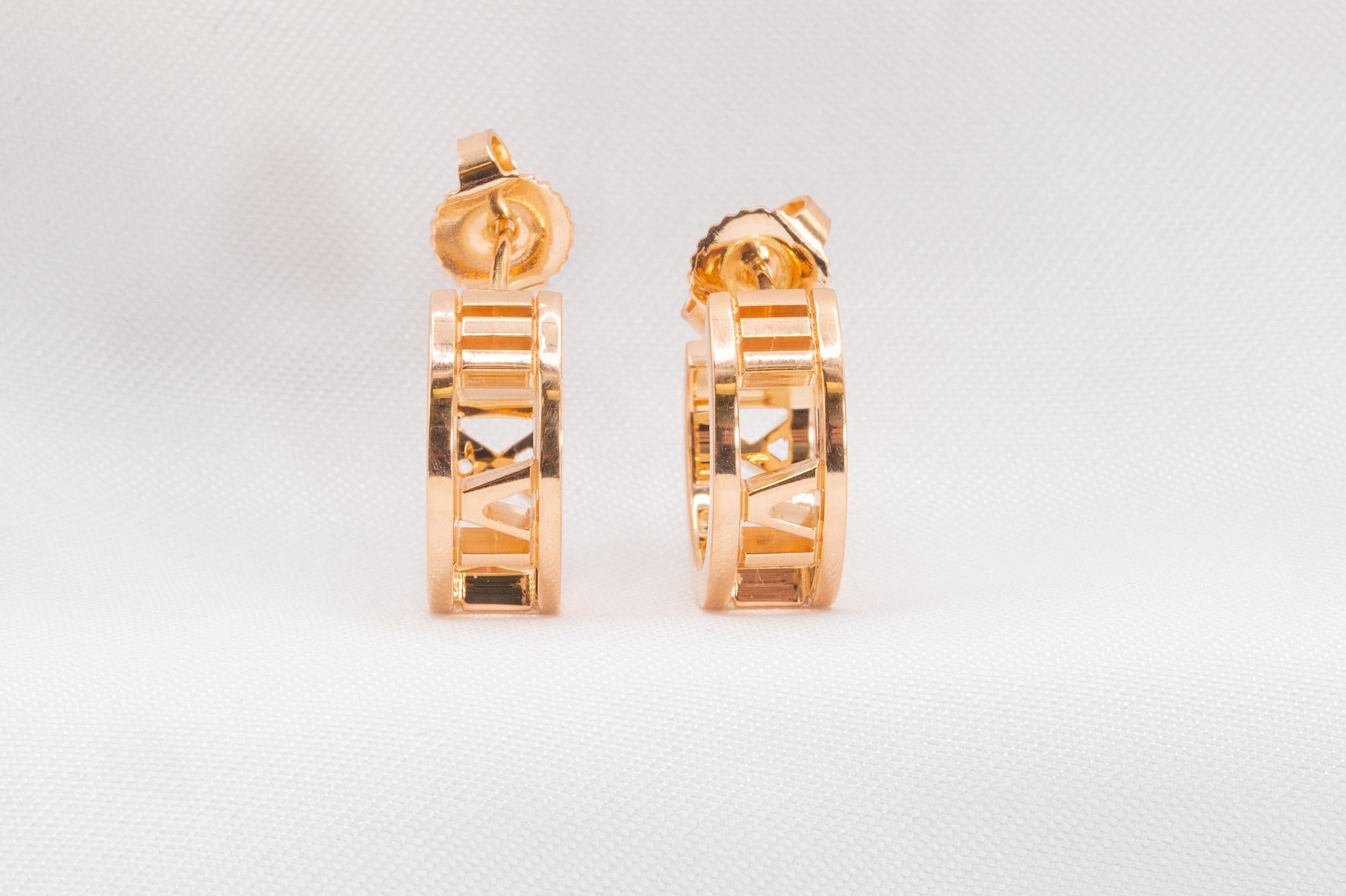 Tiffany & Co. Atlas Open Hoop Earrings in 18K Rose Gold  

These stunning hoops, crafted in 18K rose gold, feature a sleek and modern design that effortlessly elevates any look. Weighing 5 grams with a 5.4mm width, they offer the perfect blend of