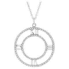 Tiffany & Co. Collier pendentif Atlas à médaillons ouverts en or blanc 18 carats avec pavé