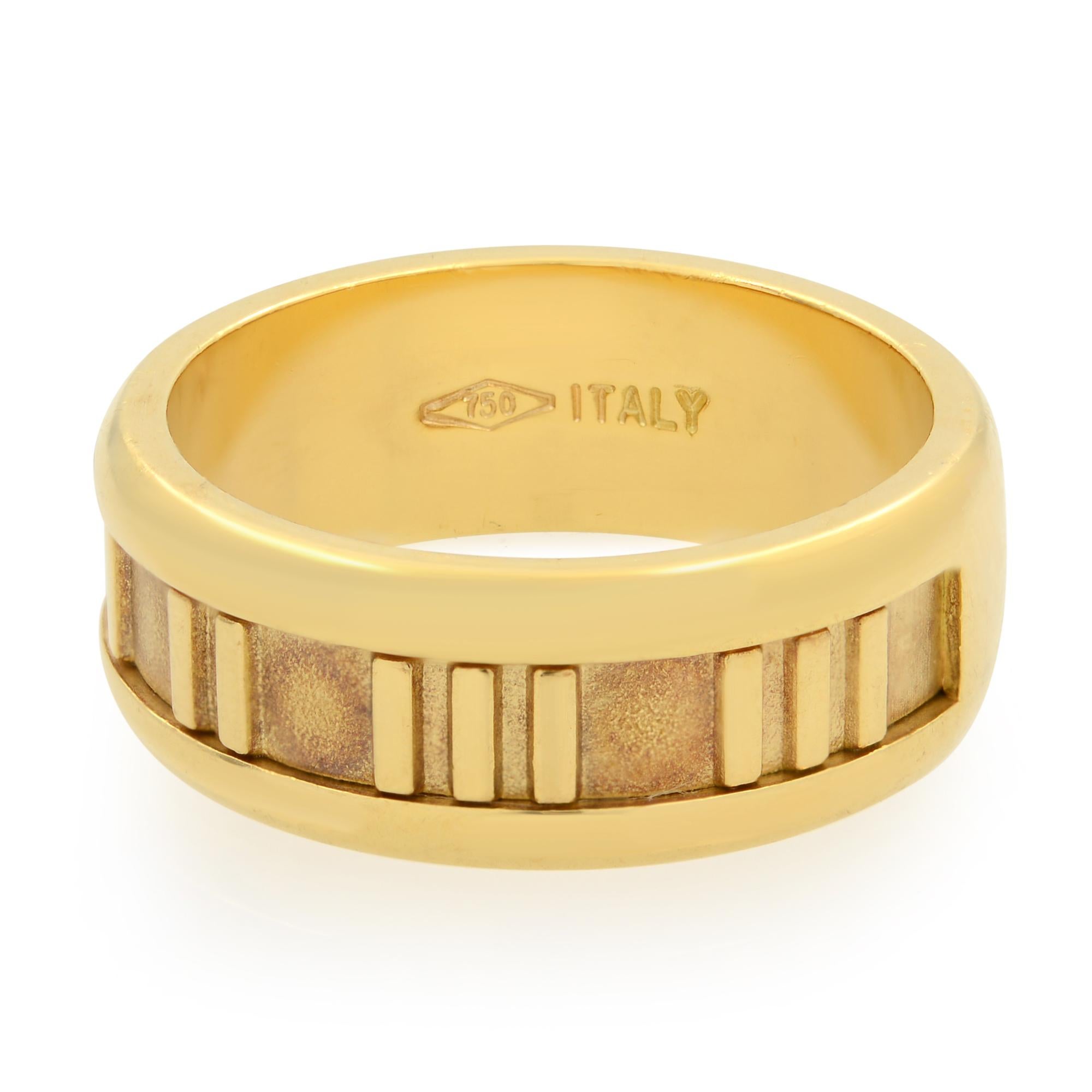 An estate Tiffany & Co. 18K yellow gold ring from Atlas collection. Ring size 6.75. Width of the band is 7.00mm. Weight: 8.90 grams. Great pre owned condition. Original box and papers are not included. Come in our presentation box. 