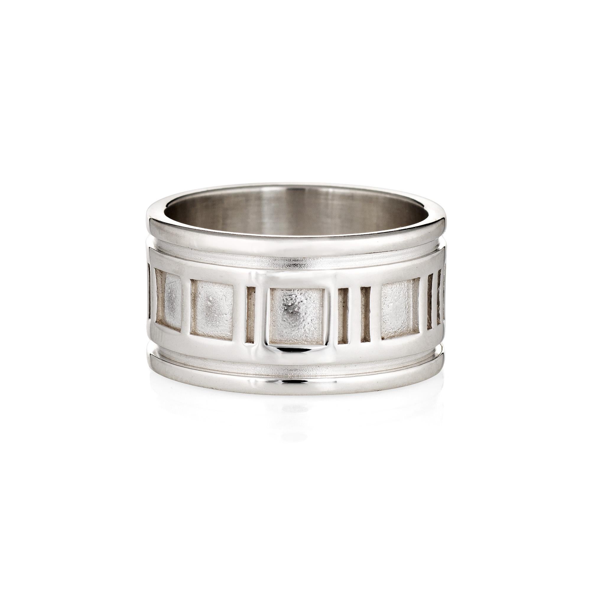 Finely detailed pre-owned Tiffany & Co Atlas ring crafted in sterling silver (circa 1995). 

The stylish ring features Roman Numerals around the entire band. The low rise ring (1.5mm - 0.05 inches) sits comfortably on the finger.  

The ring is in
