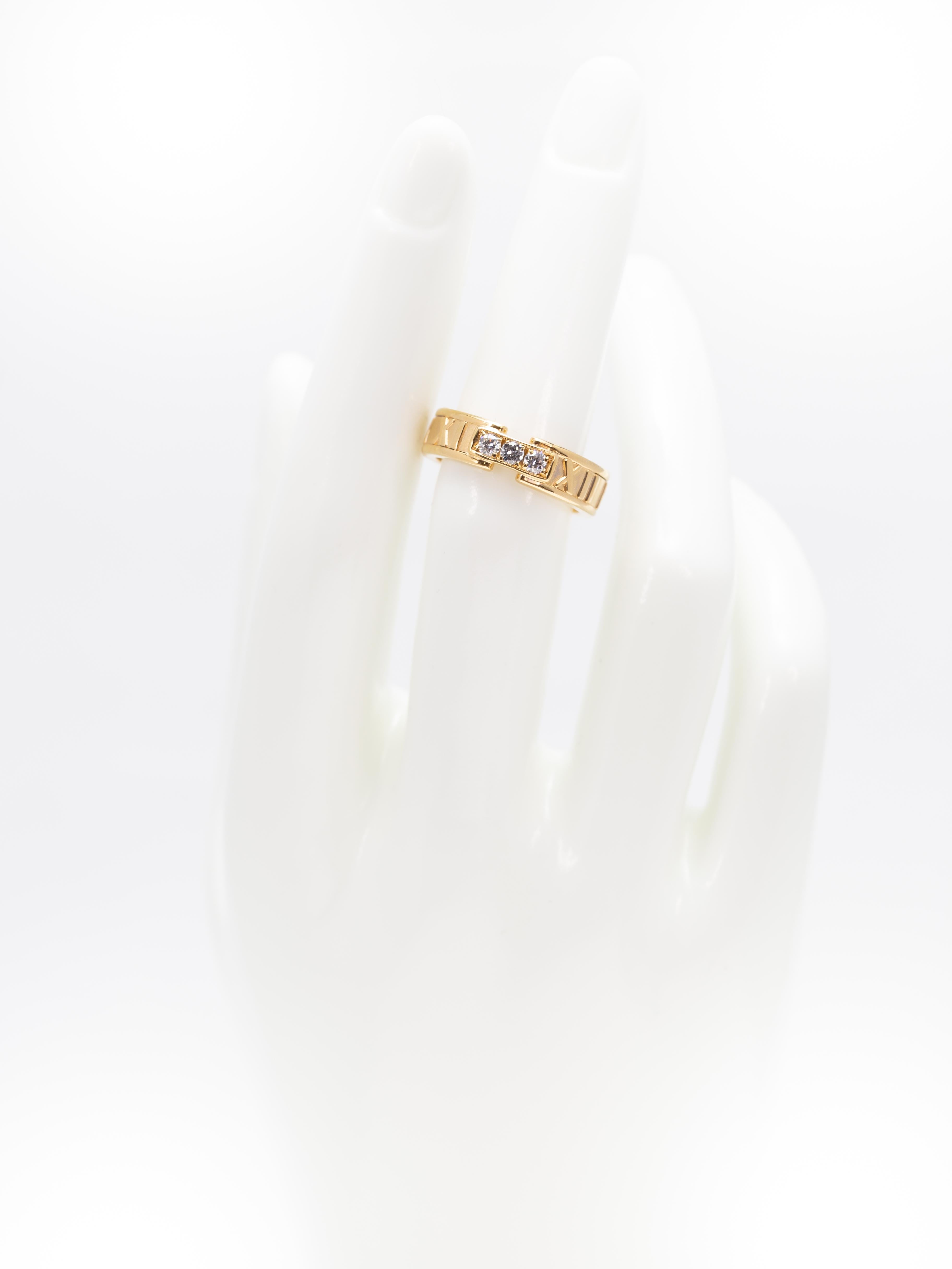 Tiffany & Co. Atlas Roman Numeral Wedding Diamond Ring in 18 Karat Gold In Good Condition In Miami, FL
