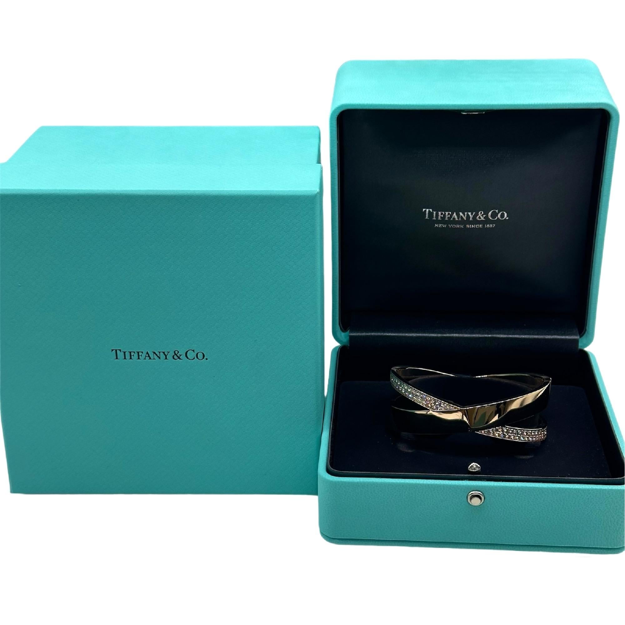 Tiffany & Co. Atlas Wide X Diamond Bangle Bracelet
Style:  Bangle 
Metal:   18kt Rose Gold
Size:  Medium
Diamonds:  66 Round Brilliant Diamonds 2.27 tcw
Measurements:  1' Inch Wide - 6.5' measured inside circumfrence
Hallmark:  ©TIFFANY&CO. Au750