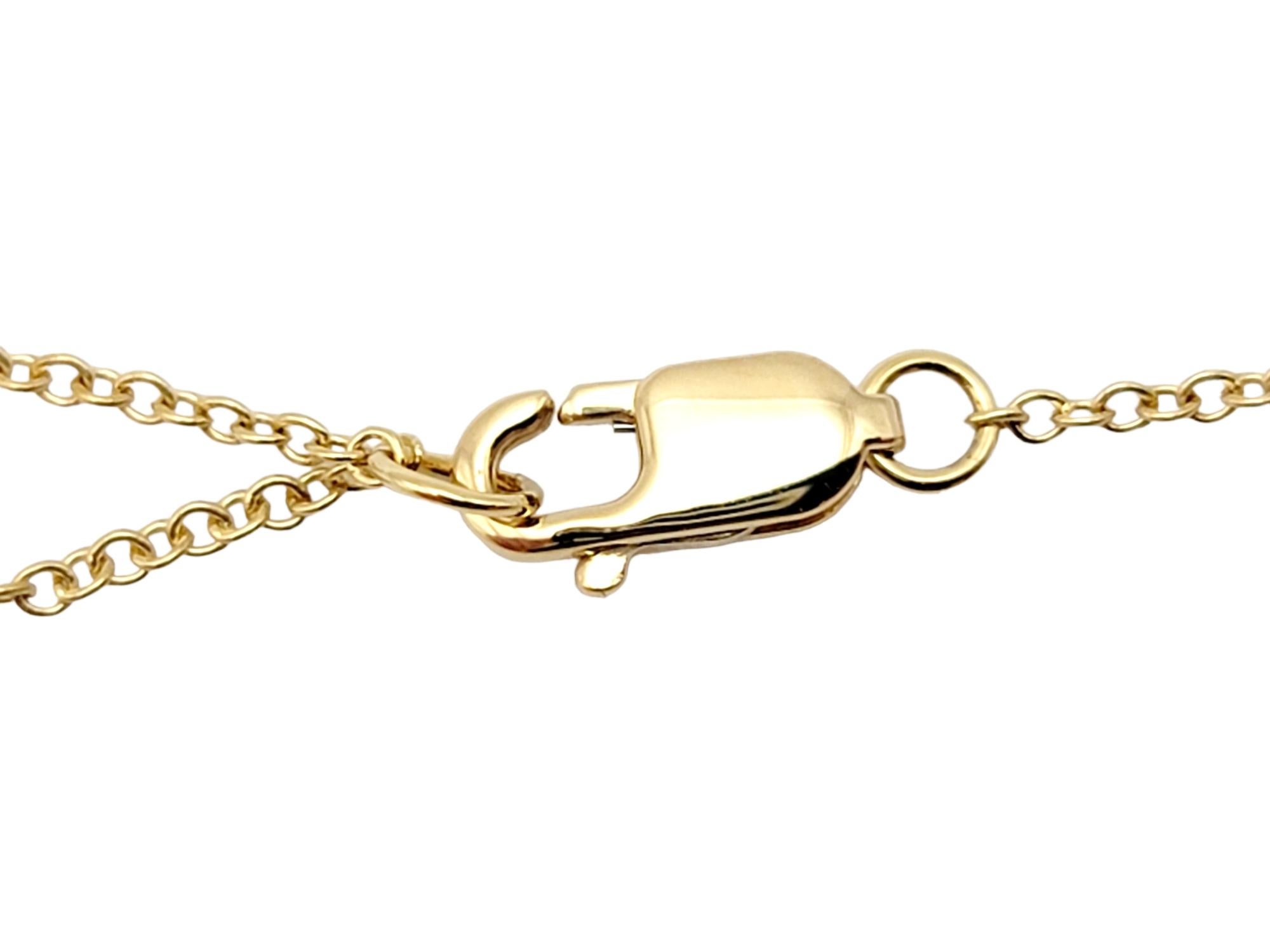 Tiffany & Co. Atlas X. Halskette mit ineinandergreifendem Anhänger aus 18 Karat Gelbgold 3