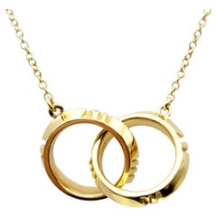 Tiffany & Co. Atlas X. Halskette mit ineinandergreifendem Anhänger aus 18 Karat Gelbgold