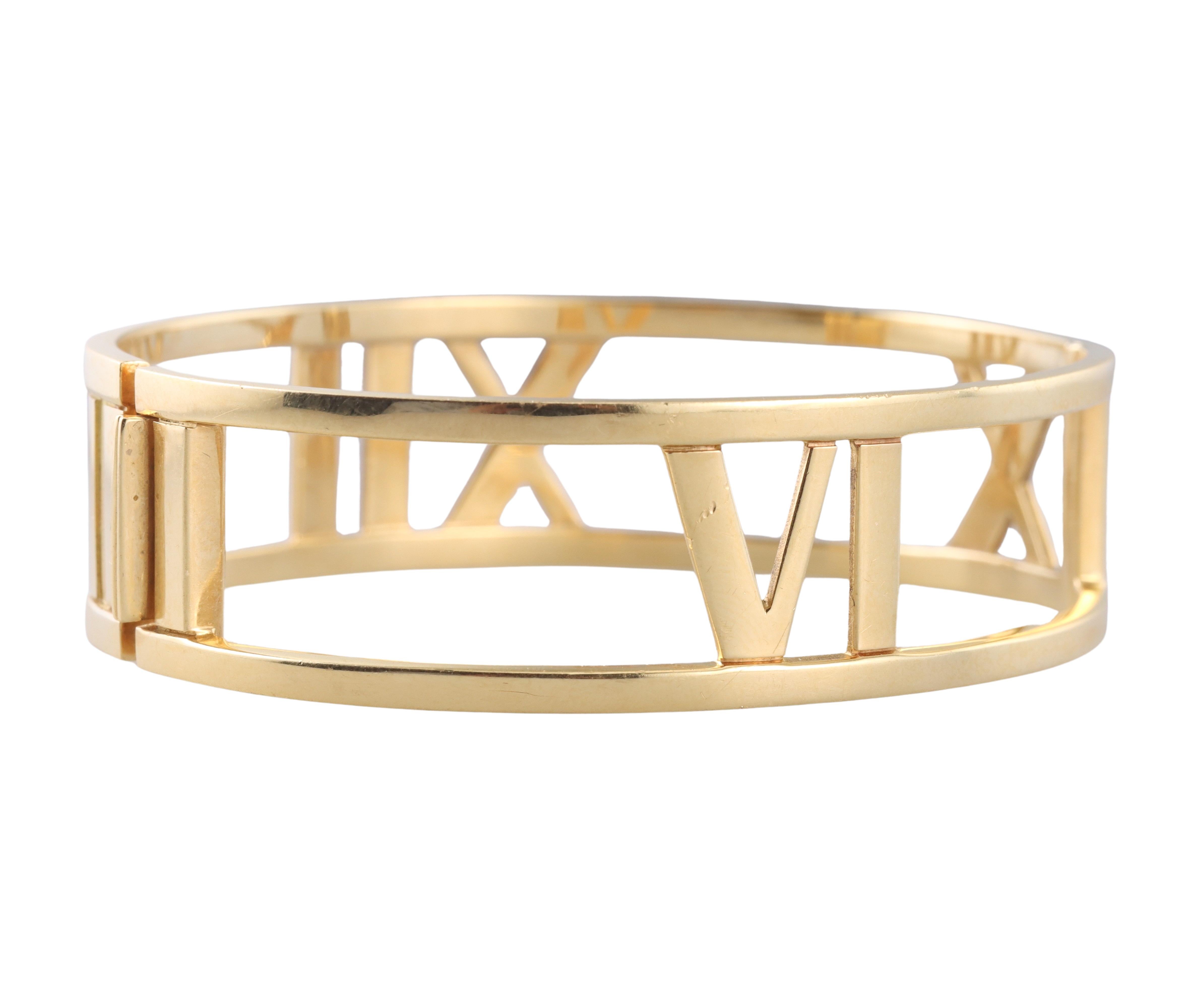 18k yellow gold bangle bracelet by Tiffany & Co, from Atlas collection. The bracelet will fit an approximately 6.5